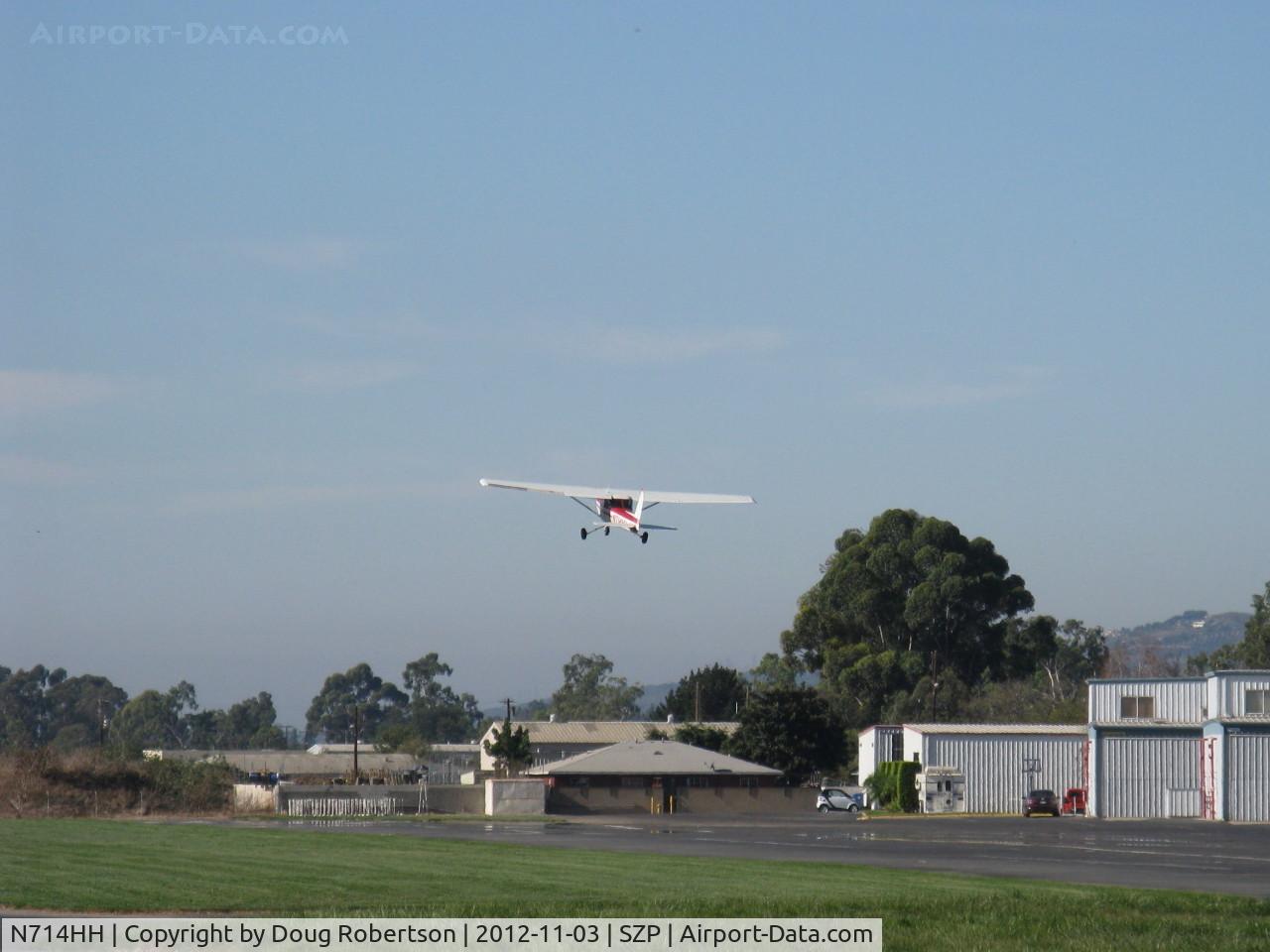 N714HH, 1977 Cessna 150M C/N 15079185, 1977 Cessna 150M, Continental O-200 100 Hp, touch and go takeoff climb Rwy 22