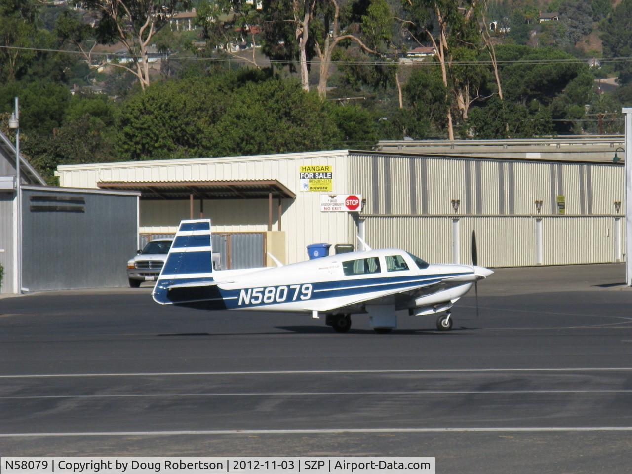 N58079, Mooney M20J 201 C/N 24-1638, 1987 Mooney M20J 201LM (Lean Machine), Lycoming IO-360-A3B6D 200 Hp, taxi from hangar