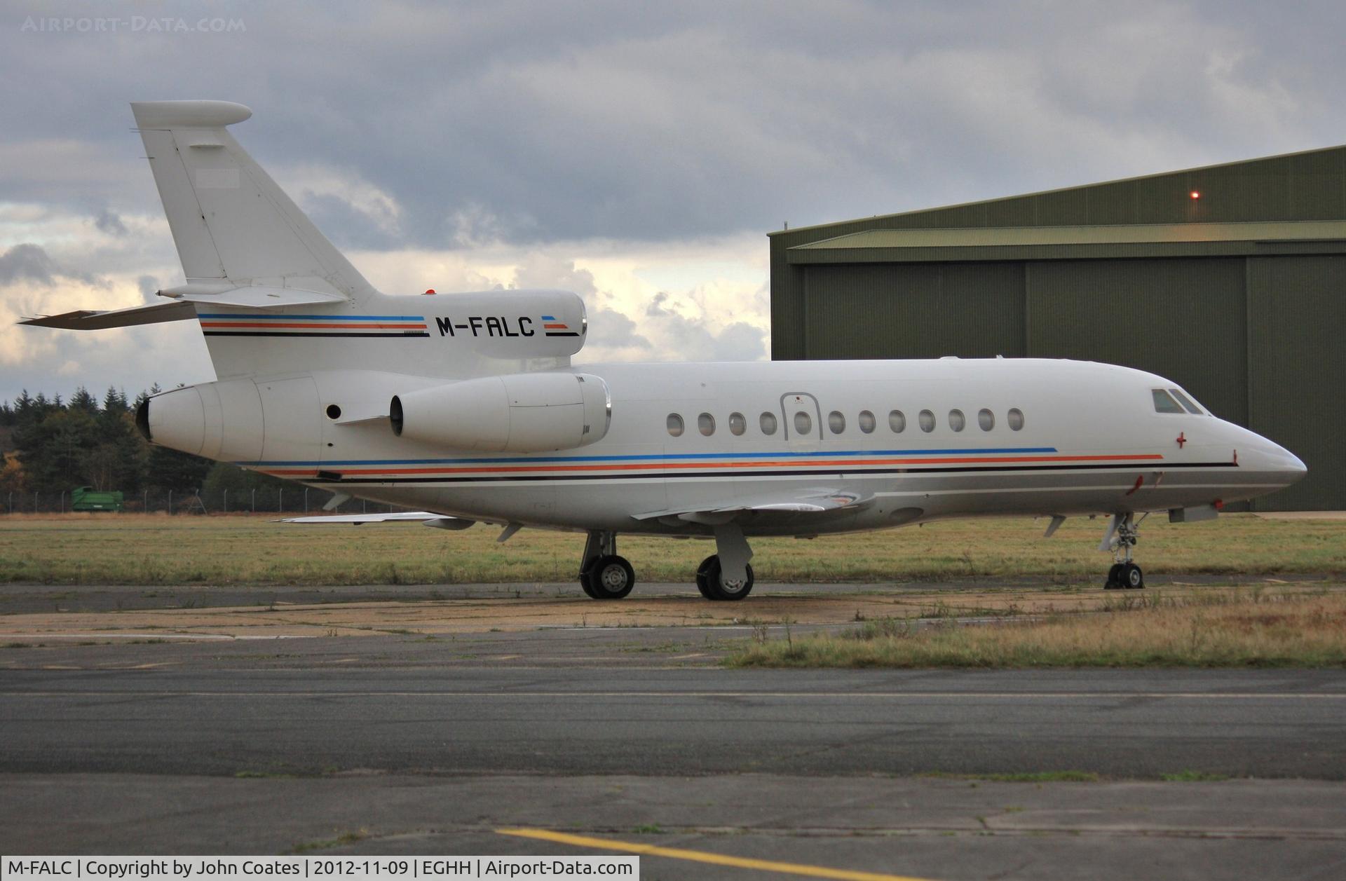 M-FALC, 1998 Dassault Falcon 900EX C/N 31, Parked at Jetworks