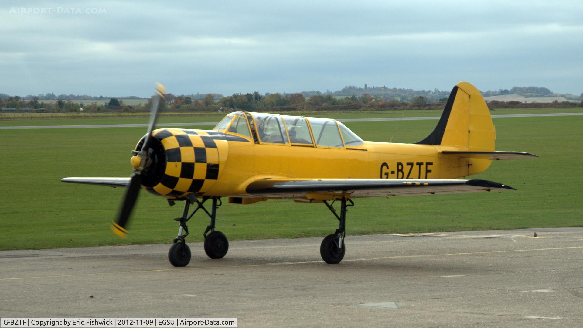 G-BZTF, 1986 Bacau Yak-52 C/N 866703, 3. G-BZTF preparing to depart Duxford Airfield.