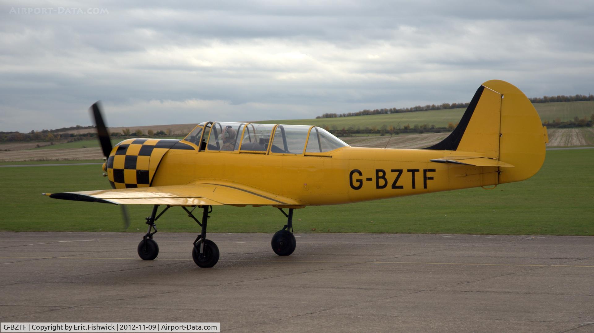 G-BZTF, 1986 Bacau Yak-52 C/N 866703, 1. G-BZTF preparing to depart Duxford Airfield.