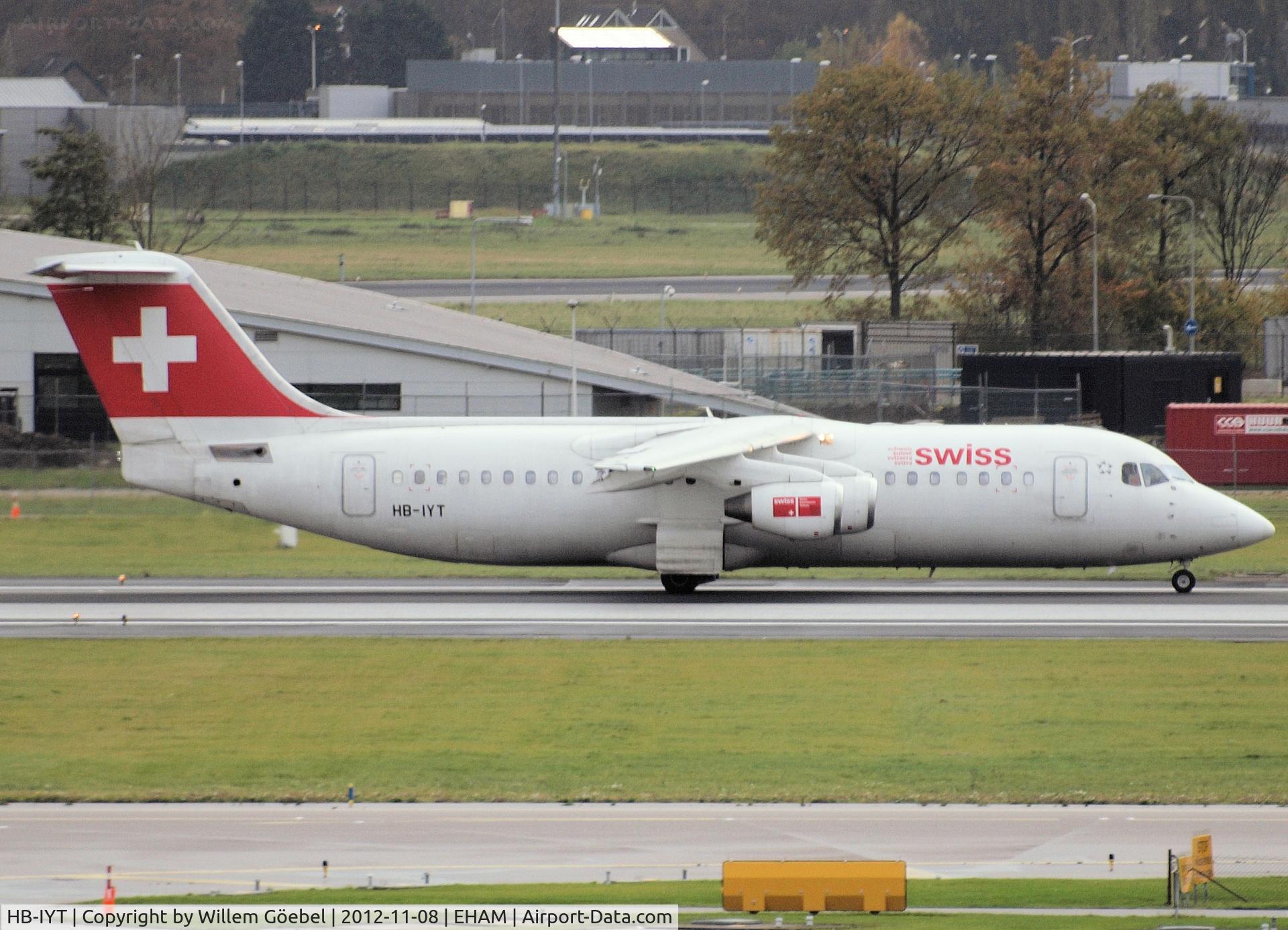 HB-IYT, 2000 British Aerospace Avro 146-RJ100 C/N E3380, Taxi to runway 24 of Schiphol Airport