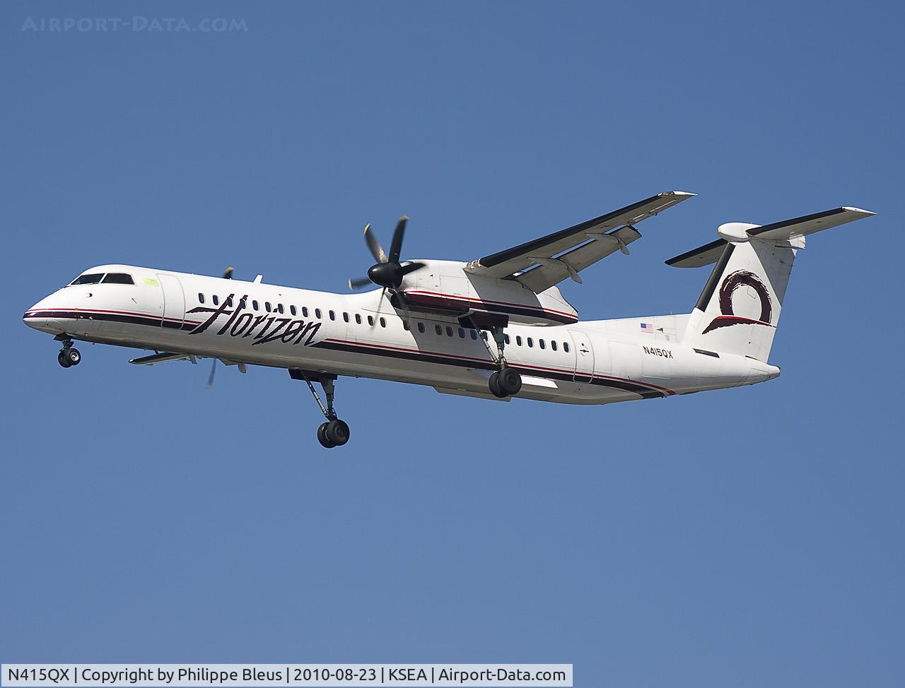 N415QX, 2003 De Havilland Canada DHC-8-402 Dash 8 C/N 4081, Final rwy 16L.