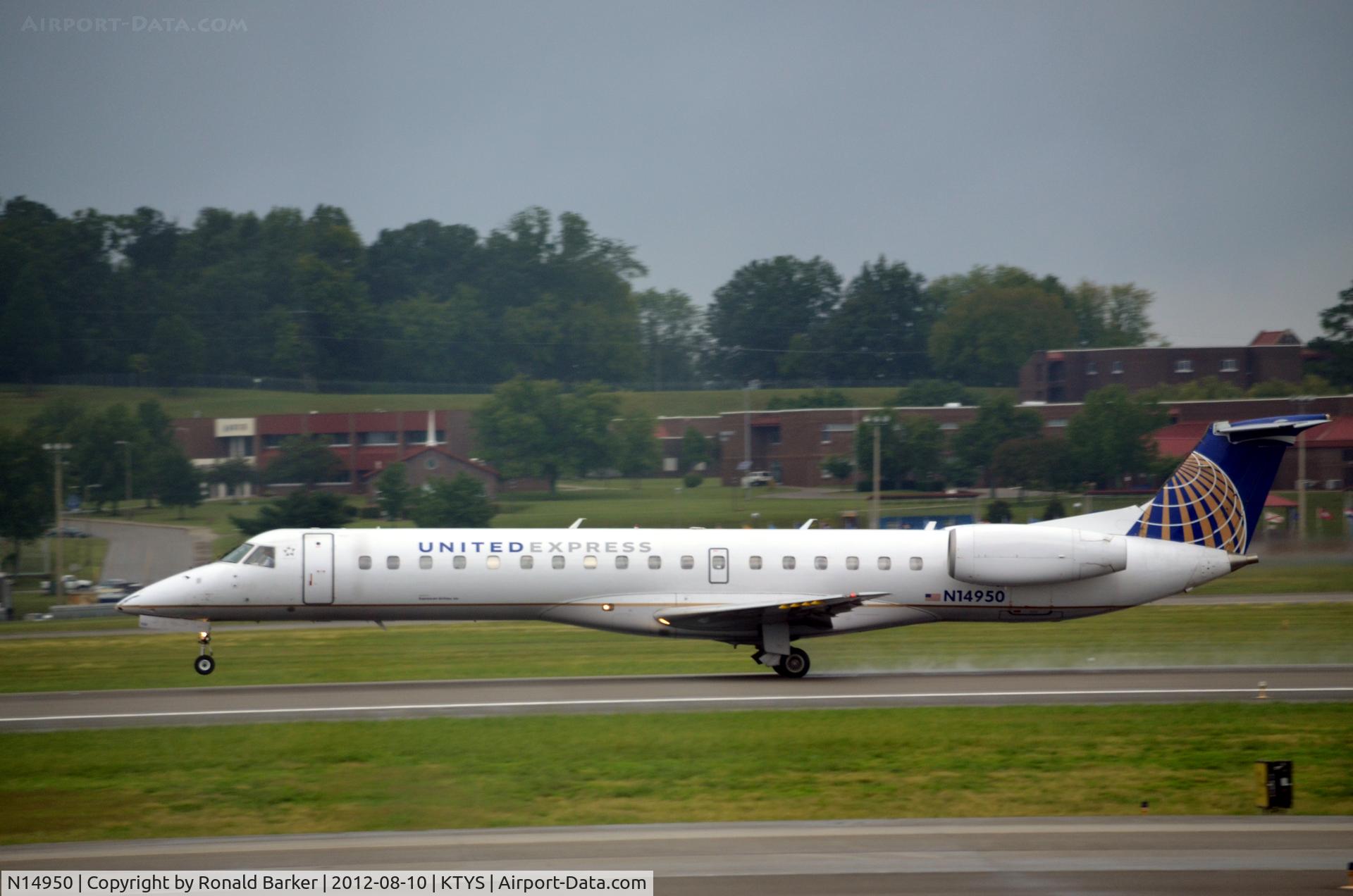 N14950, 1998 Embraer ERJ-145LR (EMB-145LR) C/N 145061, Nose wheel liftoff TYS