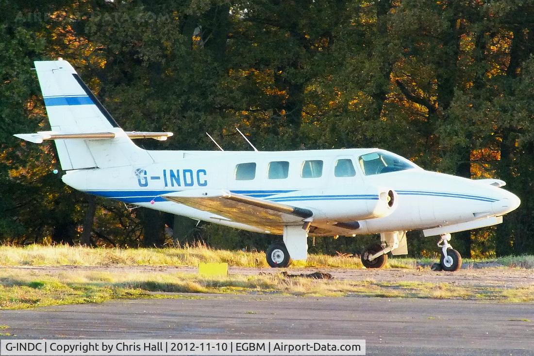 G-INDC, 1982 Cessna T303 Crusader C/N T303-00122, parked on the far side of the airfield minus both its engines