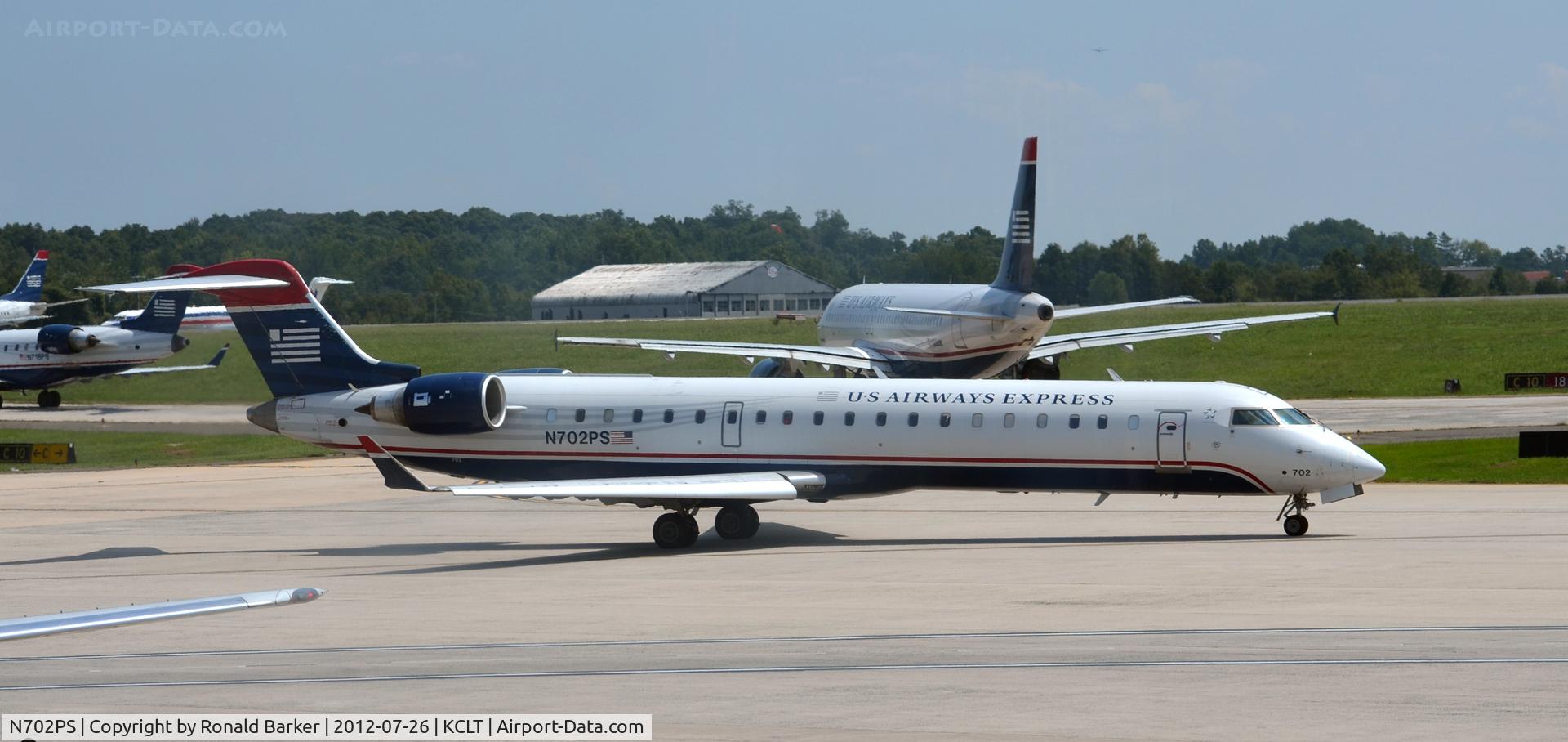 N702PS, 2004 Bombardier CRJ-701 (CL-600-2C10) Regional Jet C/N 10135, Taxi CLT