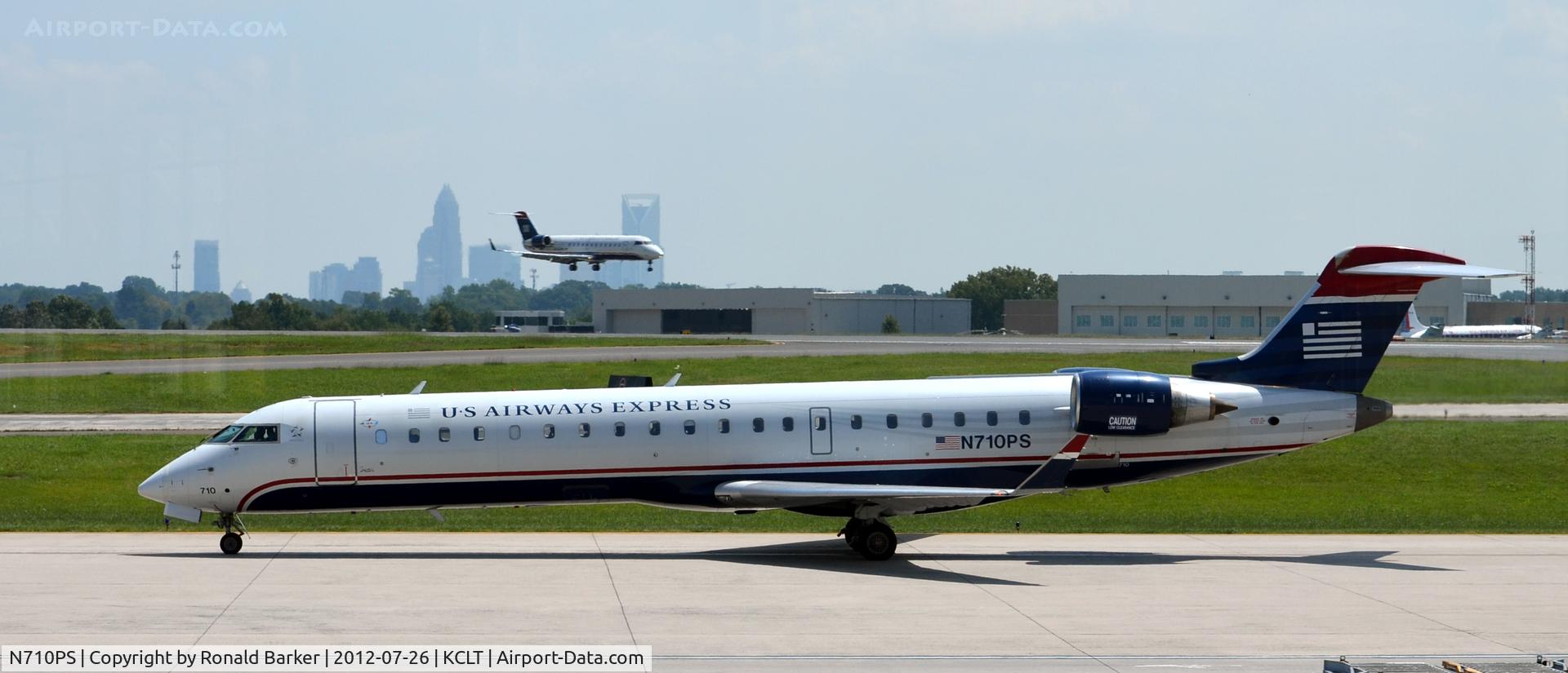 N710PS, 2004 Bombardier CRJ-701 (CL-600-2C10) Regional Jet C/N 10167, Taxi CLT
