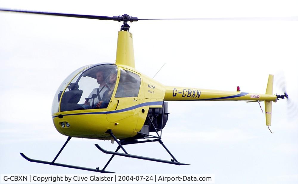 G-CBXN, 2002 Robinson R22 Beta II C/N 3385, Originally owned to, Heli Air Ltd in November 2002 and currently in private hands since January 2003. Photo taken in Weston-super-Mare sea-front.