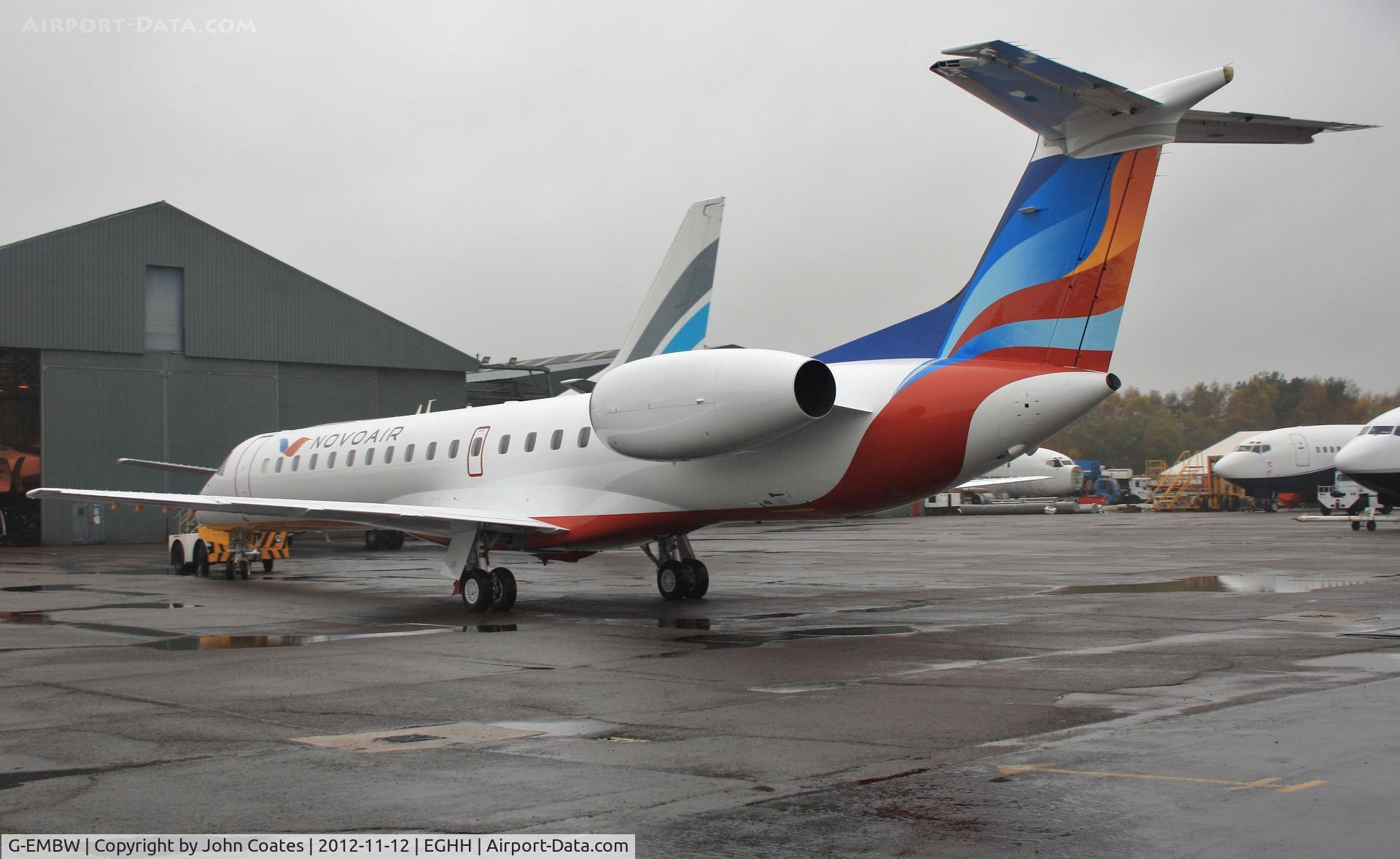 G-EMBW, 2001 Embraer EMB-145EU (ERJ-145EU) C/N 145546, Bright new scheme on a dark damp day.
Now in NovoAir, Bangladesh colours.