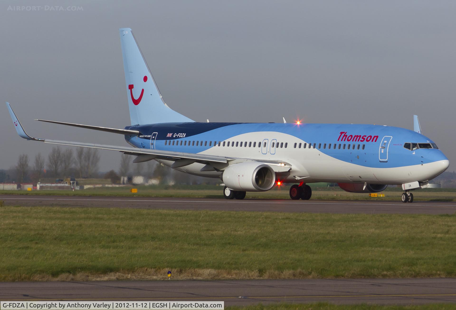 G-FDZA, 2007 Boeing 737-8K5 C/N 35134, Departing after spray into Thomson's Dreamliner livery.