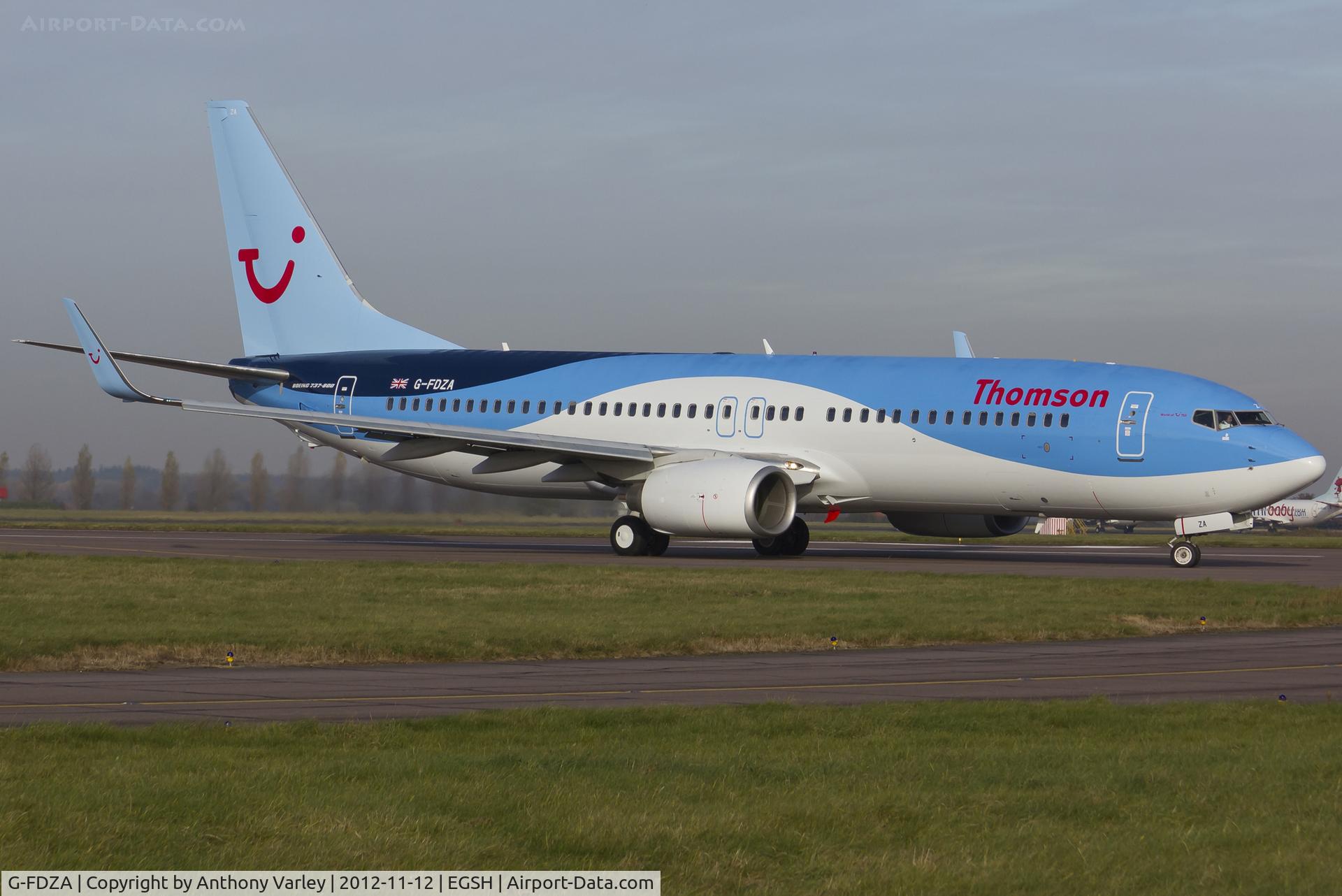 G-FDZA, 2007 Boeing 737-8K5 C/N 35134, Departing after spray into Thomson's Dreamliner livery.