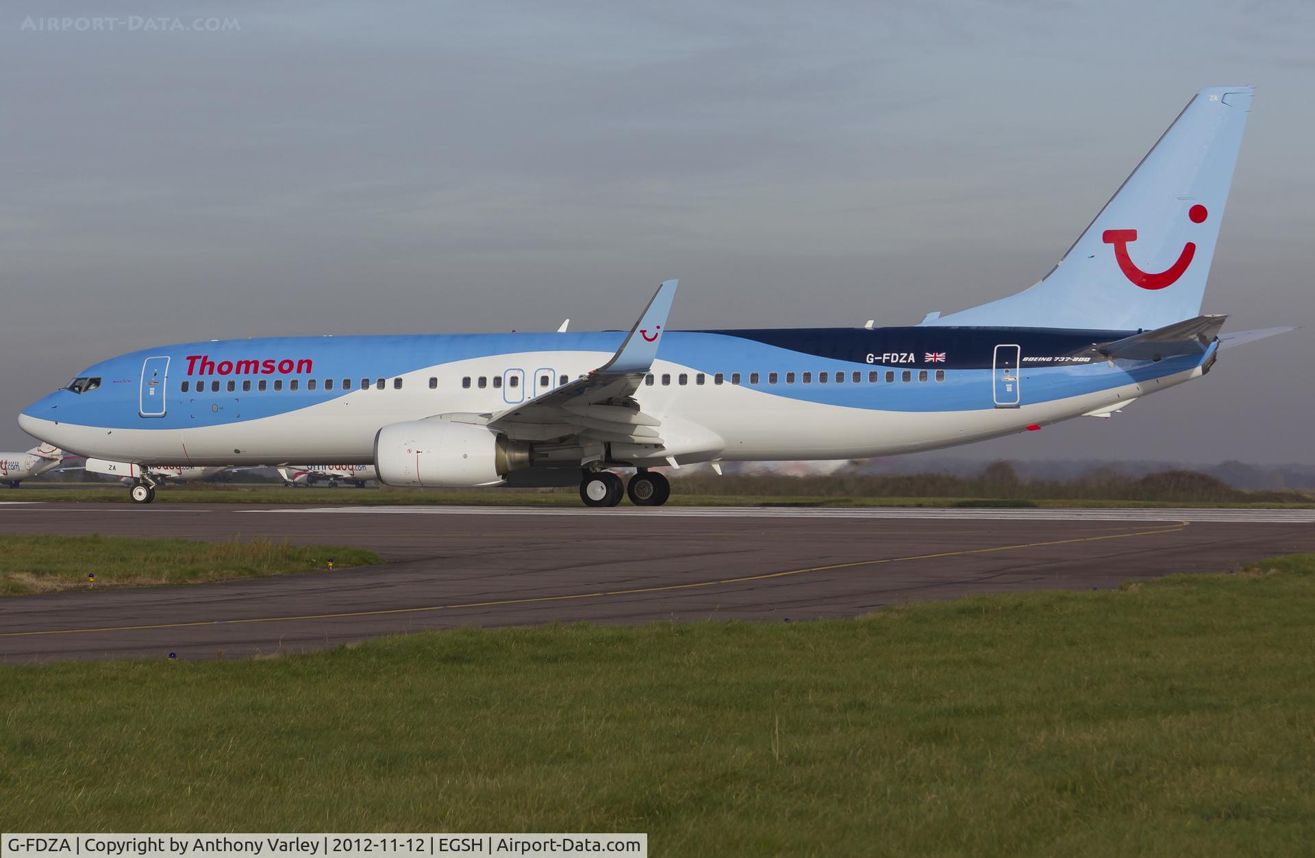 G-FDZA, 2007 Boeing 737-8K5 C/N 35134, Departing after spray into Tomson's Dreamliner livery.