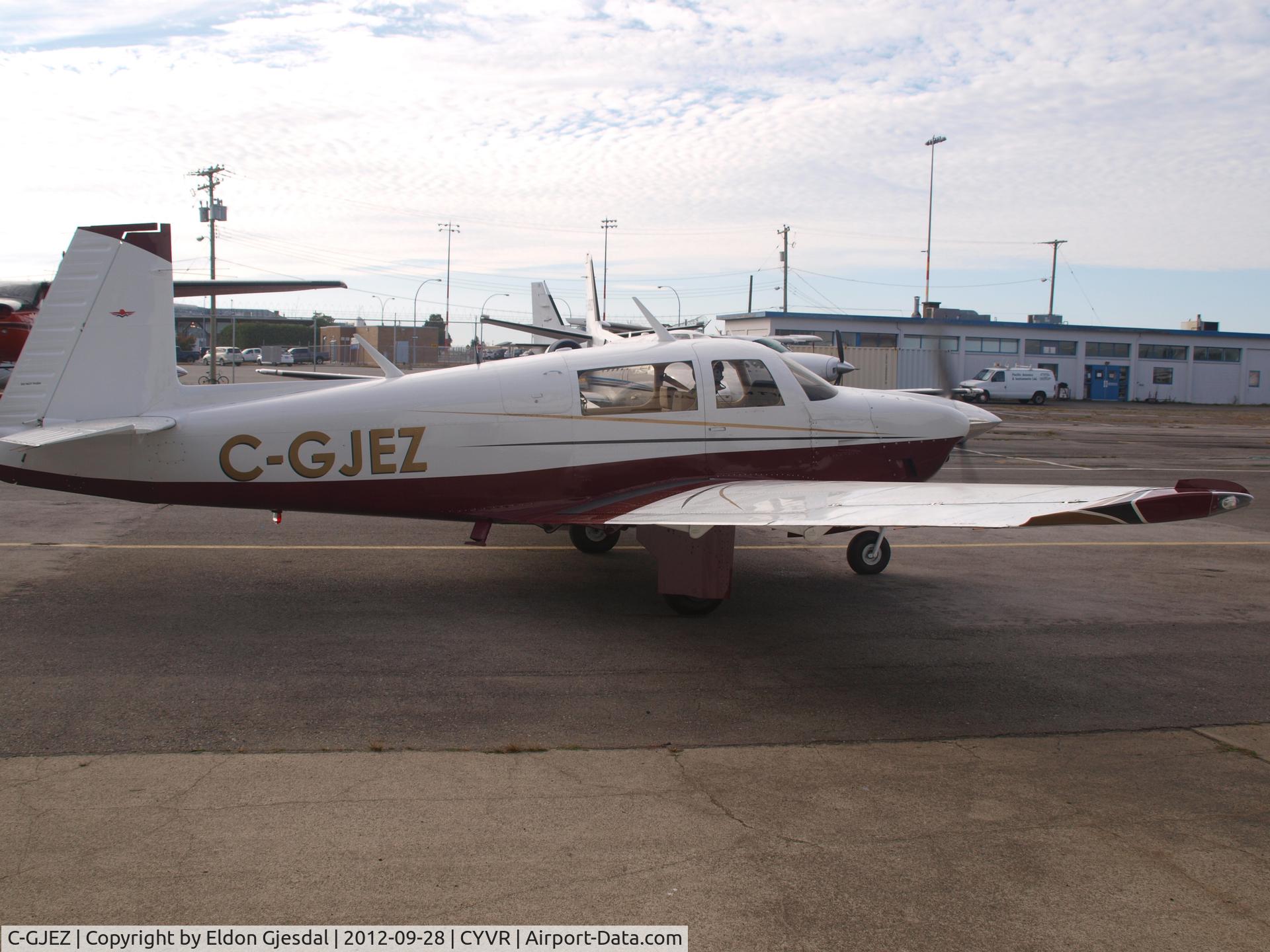 C-GJEZ, 1977 Mooney M20J 201 C/N 24-0129, leaving CYVR for CZVL