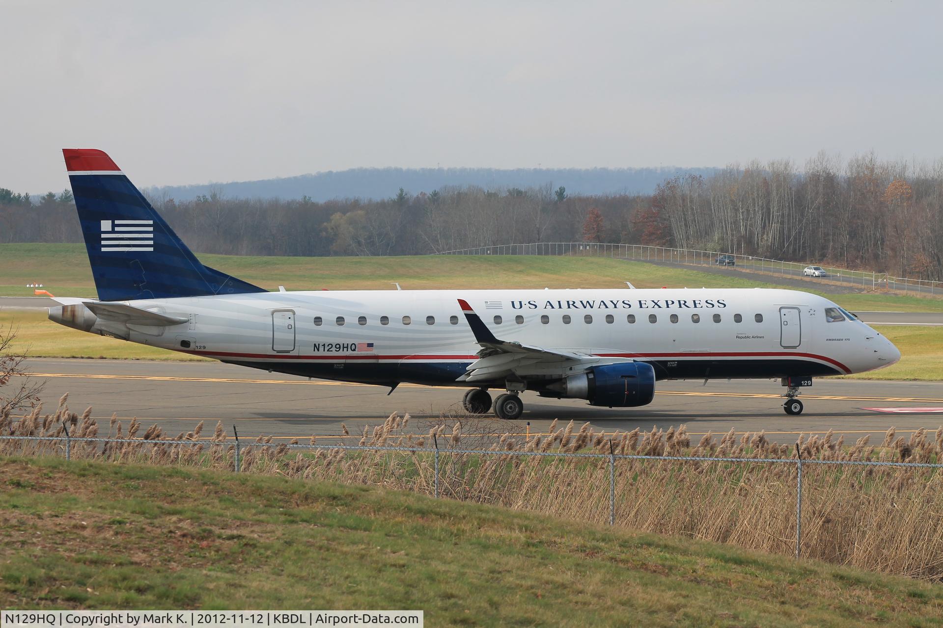 N129HQ, 2008 Embraer 175LR (ERJ-170-200LR) C/N 17000211, Republic ERJ-175 holding short of runway 24.