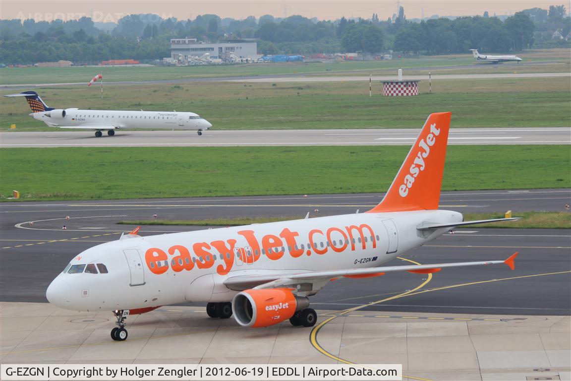 G-EZGN, 2011 Airbus A319-111 C/N 4781, Taxiing to parking position.....