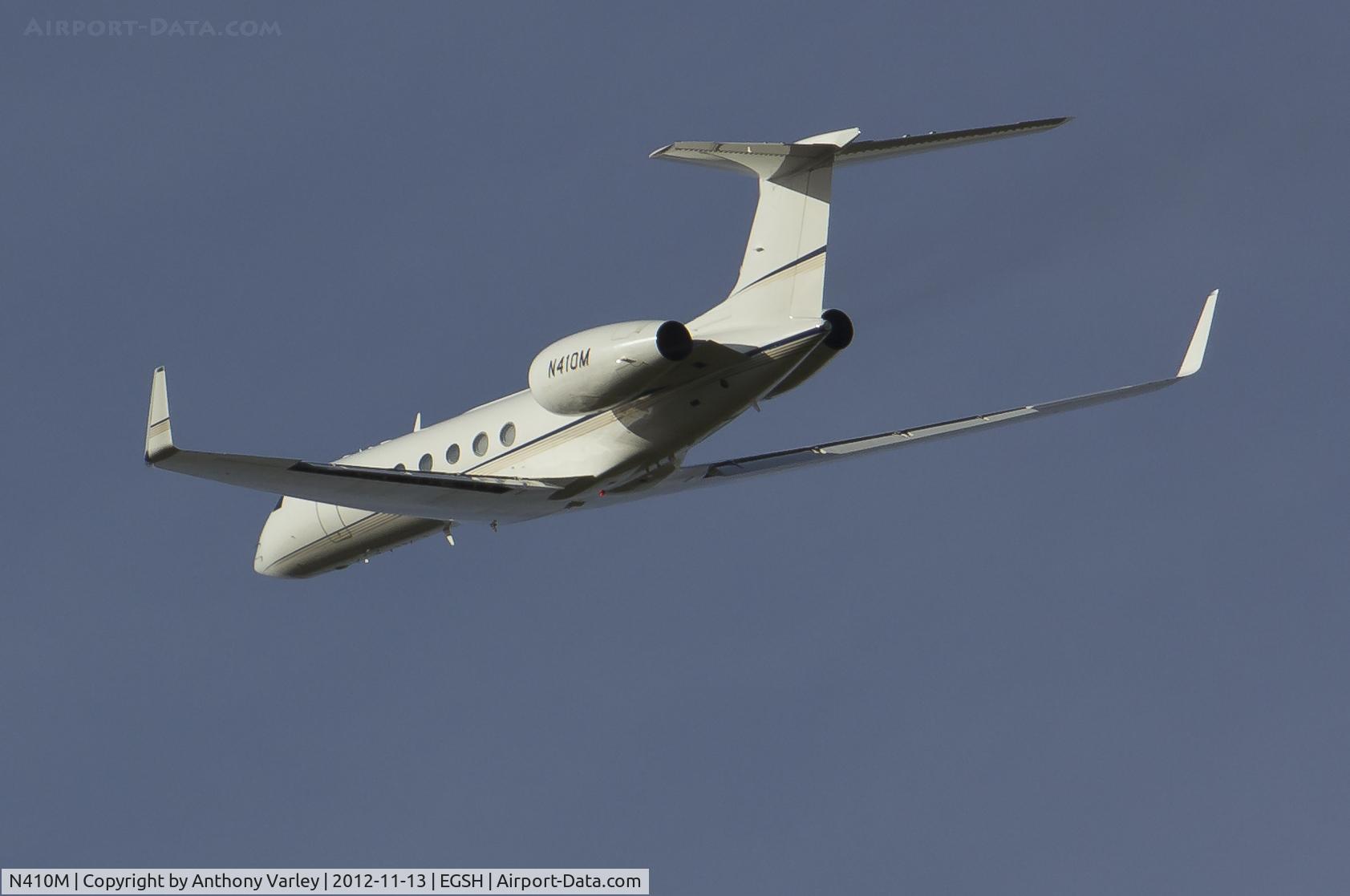 N410M, 1999 Gulfstream Aerospace G-V C/N 575, Climbing away from EGSH.