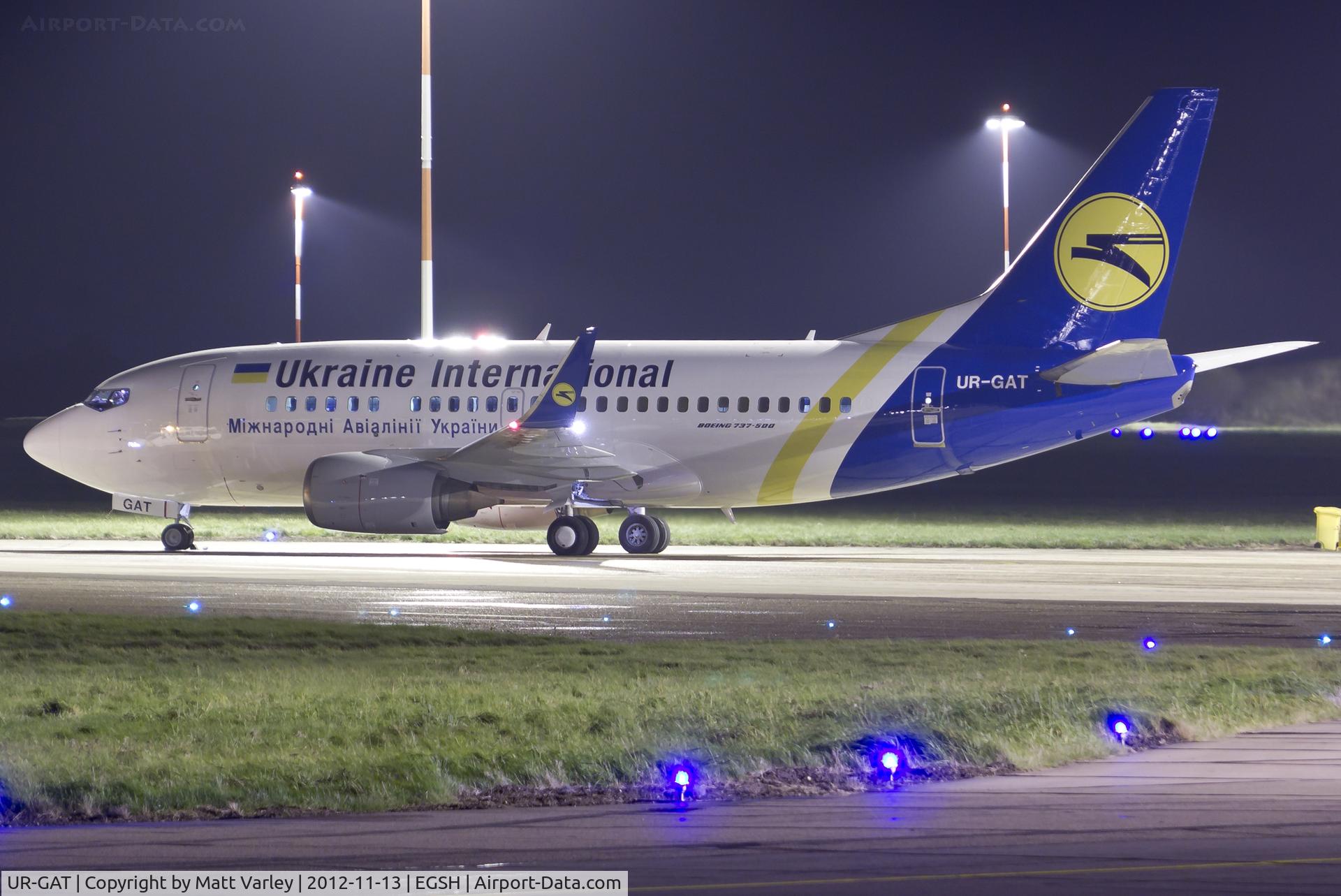 UR-GAT, 1993 Boeing 737-528 C/N 25237, About to depart EGSH after spray by Air Livery.
