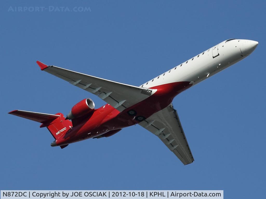 N872DC, 2011 Bombardier CRJ-700 (CL-600-2C10) Regional Jet C/N 10322, Leaving PHL