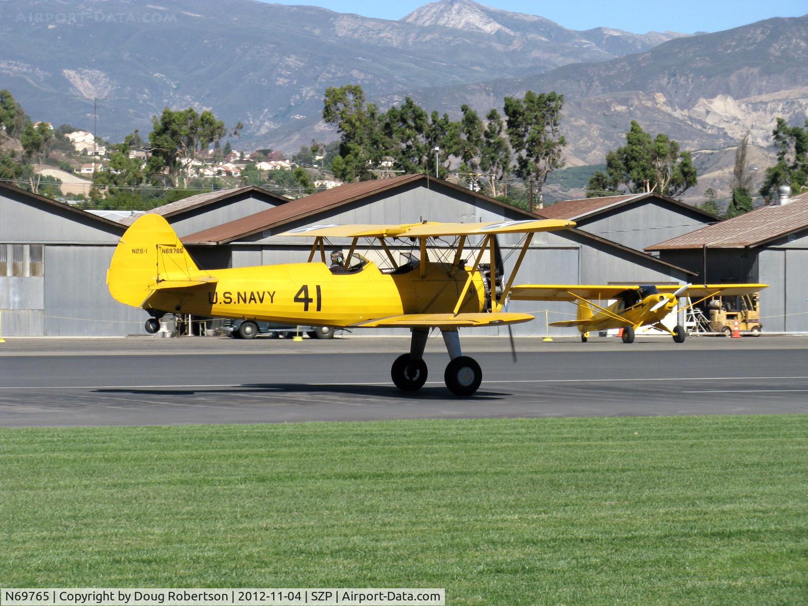 N69765, 1941 Boeing A75N1 (PT17) C/N 75-1044, 1941 Boeing Stearman A75N1 as Navy N2S1, Continental W670 220 Hp, landing roll 04