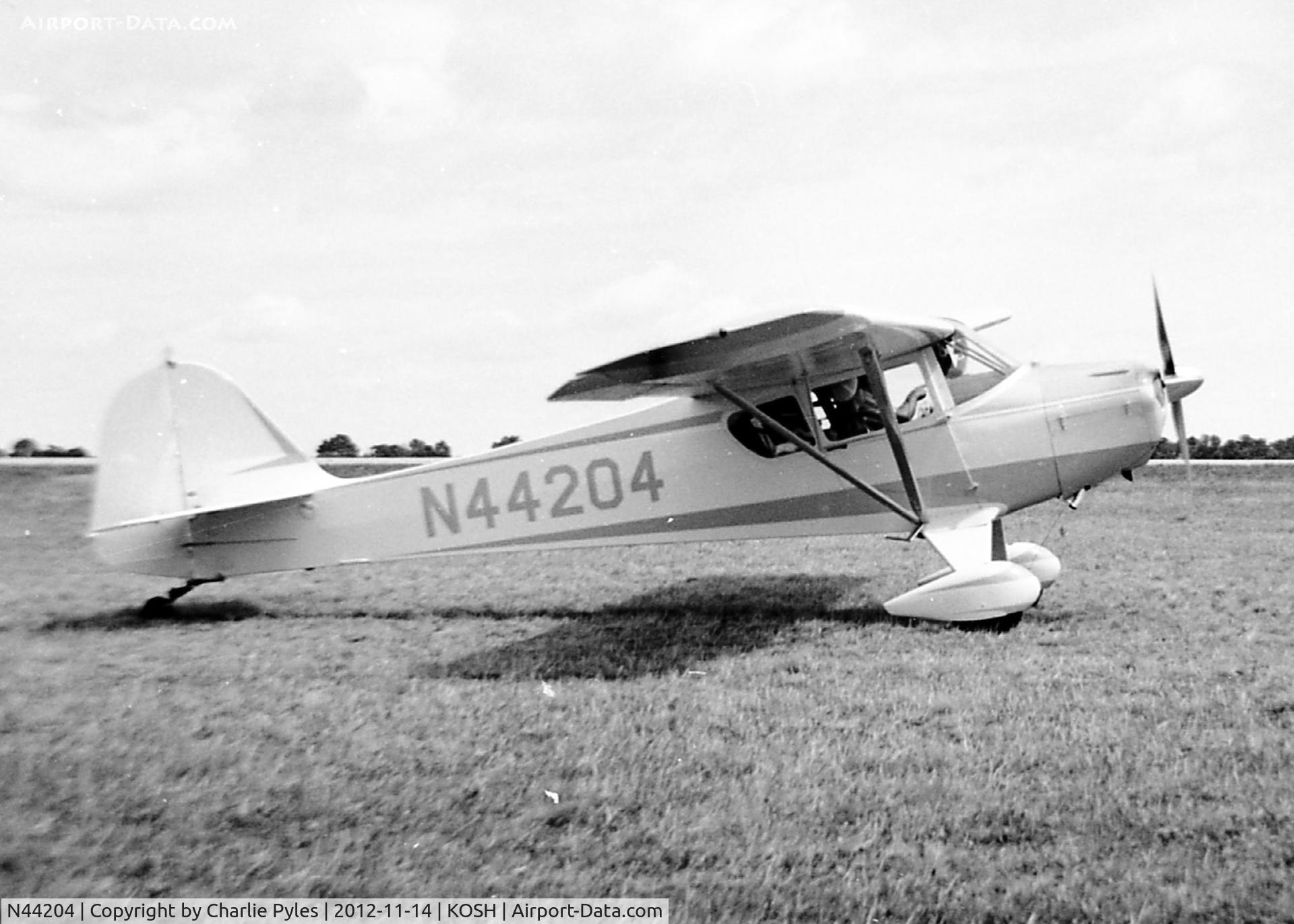 N44204, 1946 Taylorcraft BC12-D1 C/N 10004, Shot in July 1974 at the Oshkosh Air Show.