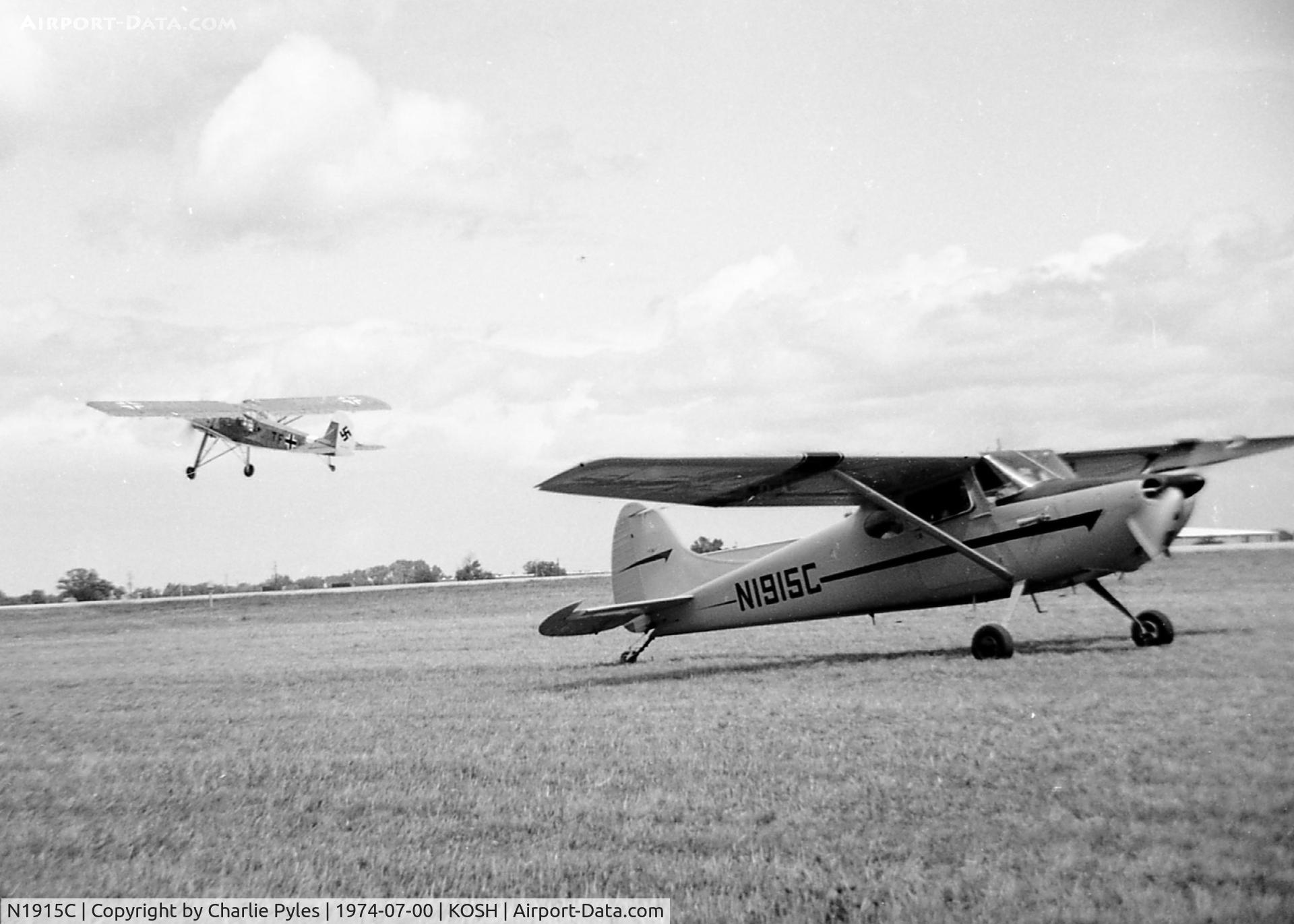 N1915C, 1953 Cessna 170B C/N 26060, The first time I ever saw a Fieseler Fi 156 Storch was here and one is seen lifting off behind the 170.