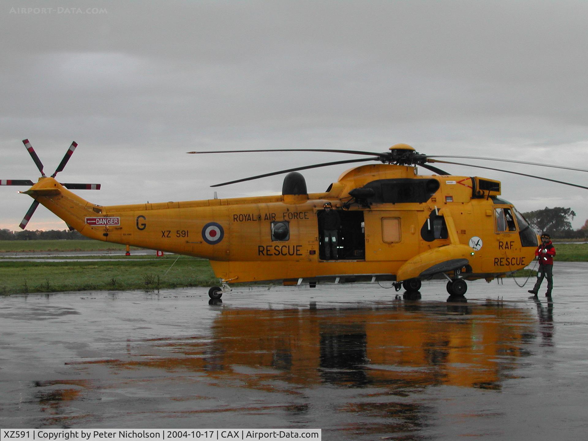 XZ591, 1978 Westland Sea King HAR.3 C/N WA857, Sea King HAR.3, callsign Rescue 128, of 202 Squadron at RAF Boulmer on a visit to Carlisle in October 2004.