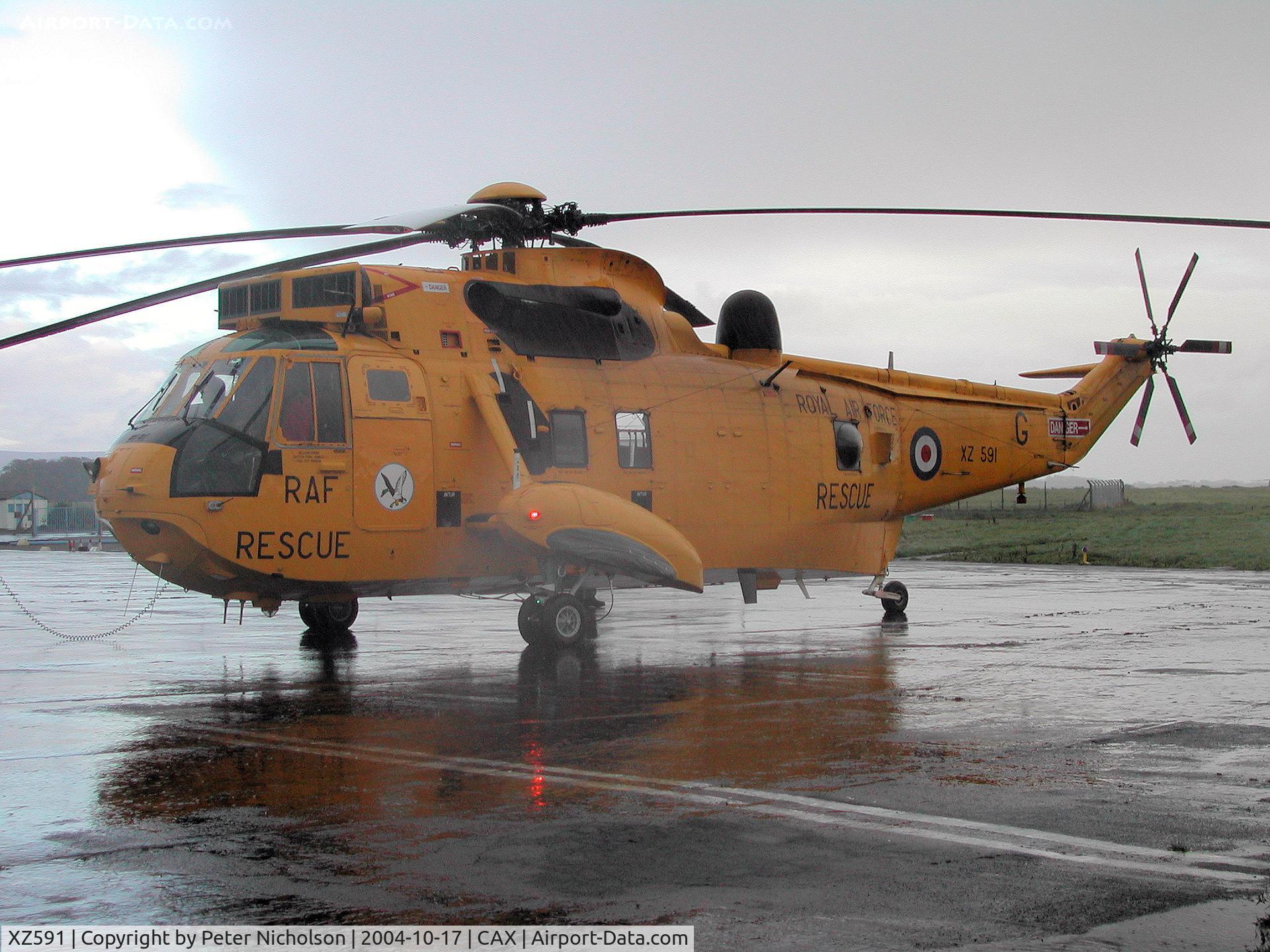 XZ591, 1978 Westland Sea King HAR.3 C/N WA857, Sea King HAR.3, callsign Rescue 128, on a visit to Carlisle from RAF Boulmer in October 2004.