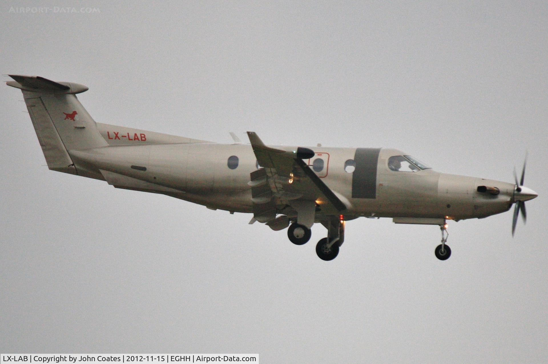 LX-LAB, 2003 Pilatus PC-12/45 C/N 531, Short finals to 08 in very murky weather