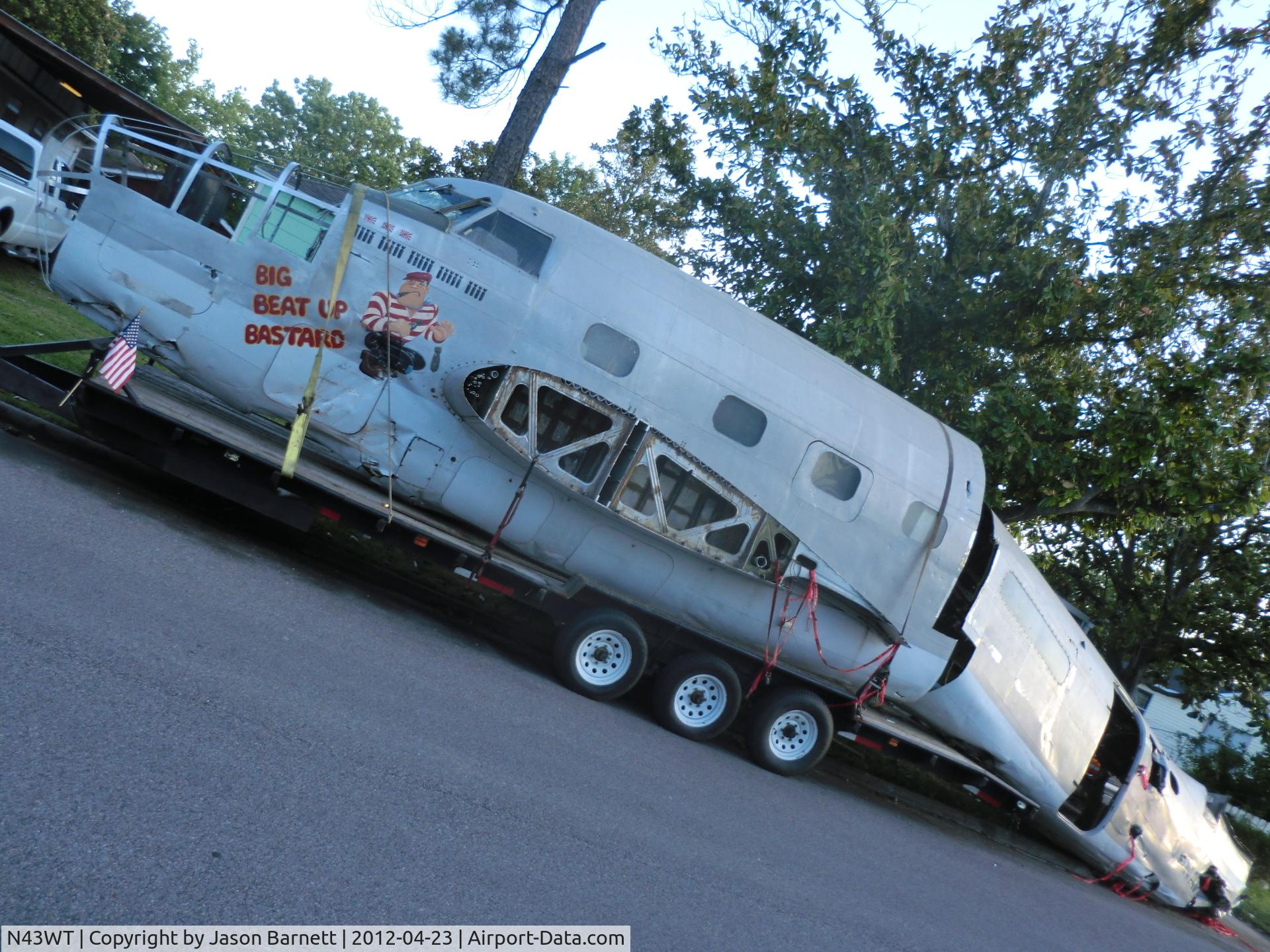 N43WT, 1943 Lockheed 18-56 Lodestar Lodestar C/N 18-2565, This was taken a few minutes after the tail was cut off. It was extremely beat up on the other side and the tail had severe corrosion. The tail was cut up into many pieces to later be used to paint replica nose art on.