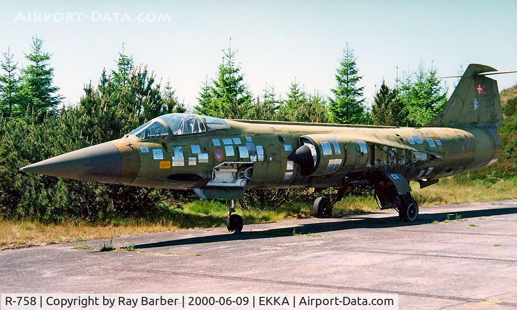 R-758, Lockheed CF-104 Starfighter C/N 683A-1058, Lockheed CF-104 Starfighter [683A-1058] Karup~OY 09/06/2000. Used for ABDR, Aircraft Battle Damage Repair, at Tirstrup and Karup. Seen here for paint trials left in the open with various paint samples applied. Broken up in 2010 at Bjerrinbro~OY. 