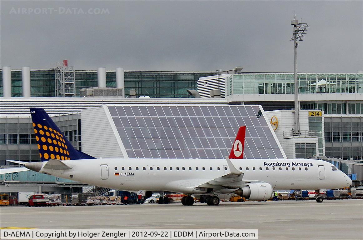 D-AEMA, 2009 Embraer 195LR (ERJ-190-200LR) C/N 19000290, Still life with red shark finn......