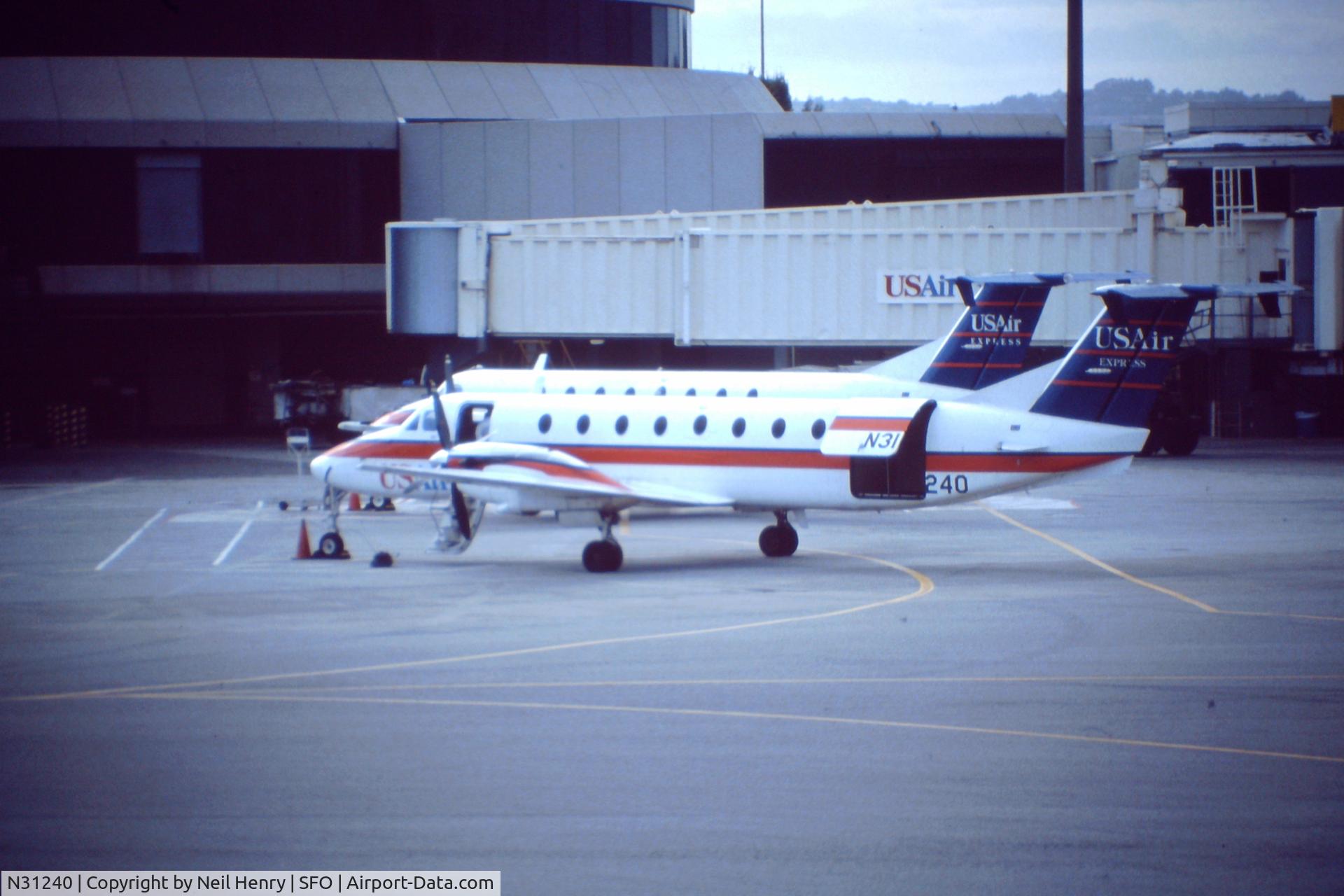 N31240, Beech 1900C C/N UC-28, Scanned from original slide - taken at SFO - mid-May 1991
