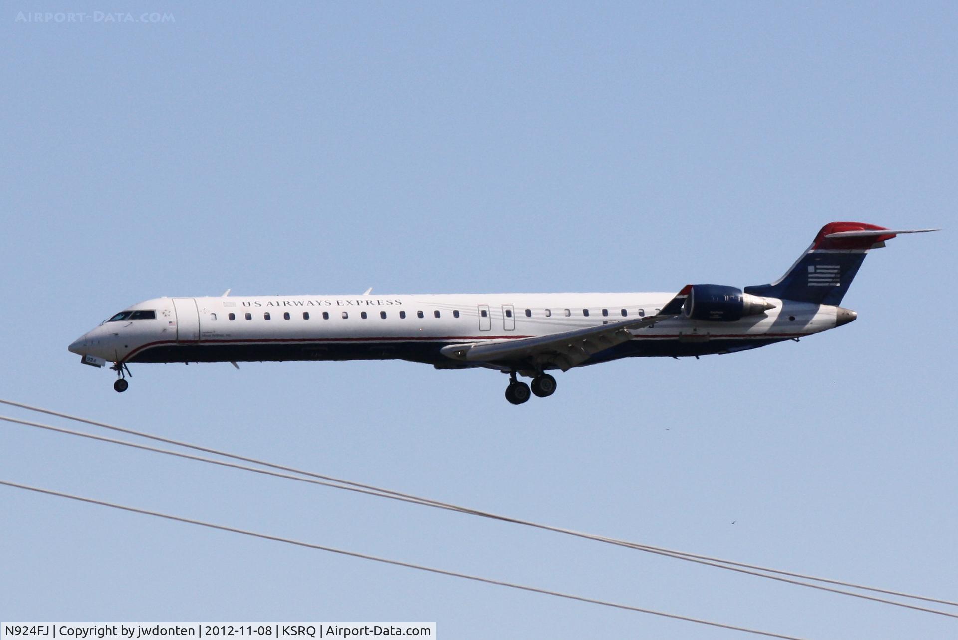 N924FJ, 2004 Bombardier CRJ-900ER (CL-600-2D24) C/N 15024, US Air Flight 2675 operated by Mesa (N924FJ) arrives at Sarasota-Bradenton International Airport following a flight from Charlotte-Douglas International Airport