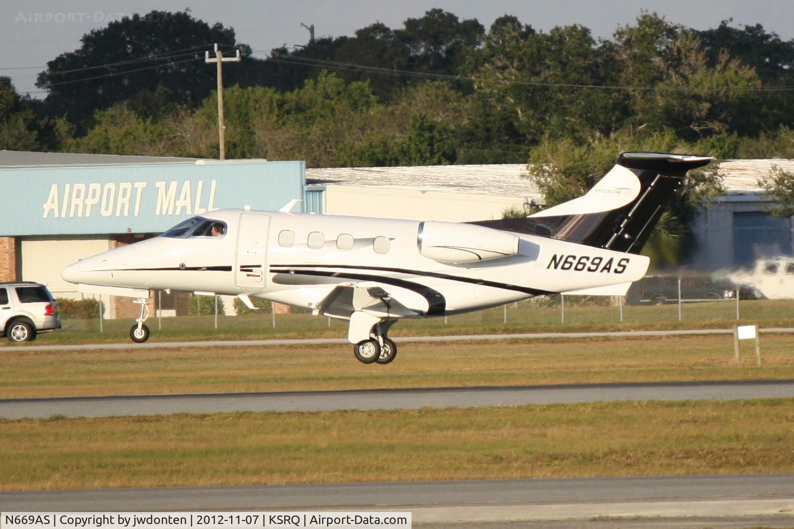 N699AS, 1966 Aero L-29 Delfin C/N 691895, Embraer Phenom 100 (N669AS) departs Sarasota-Bradenton International Airport enroute to Naples Municipal Airport