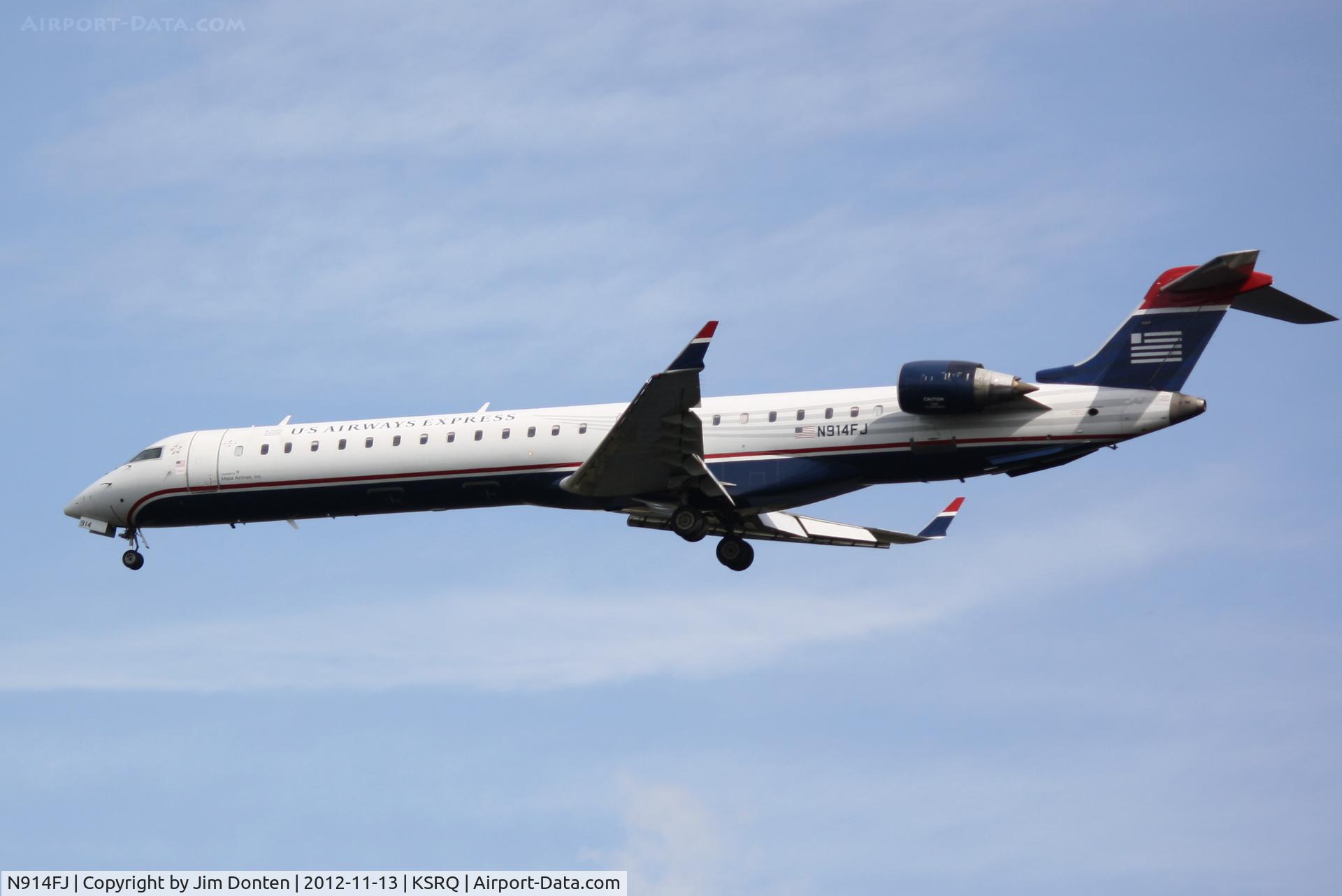 N914FJ, 2004 Bombardier CRJ-900ER (CL-600-2D24) C/N 15014, US Air Flight 2675 operated by Mesa (N914FJ) arrives at Sarasota-Bradenton International Airport following a flight from Charlotte-Douglas International Airport