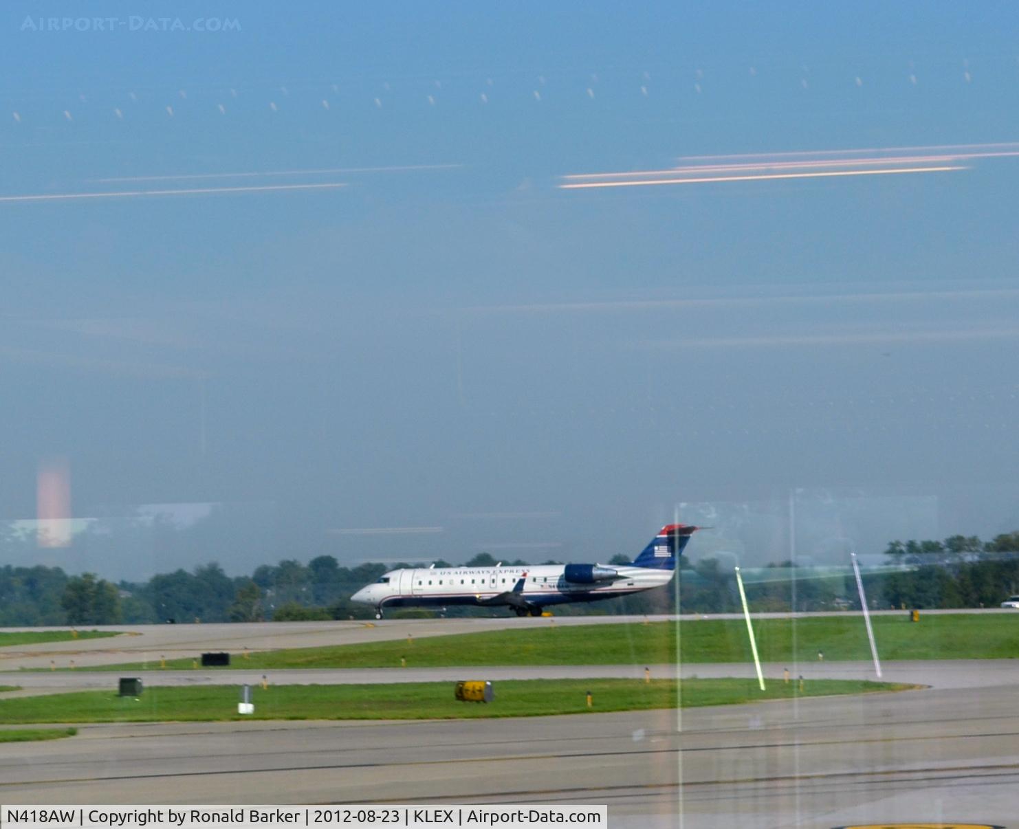 N418AW, 2002 Bombardier CRJ-200LR (CL-600-2B19) C/N 7618, Takeoff LEX