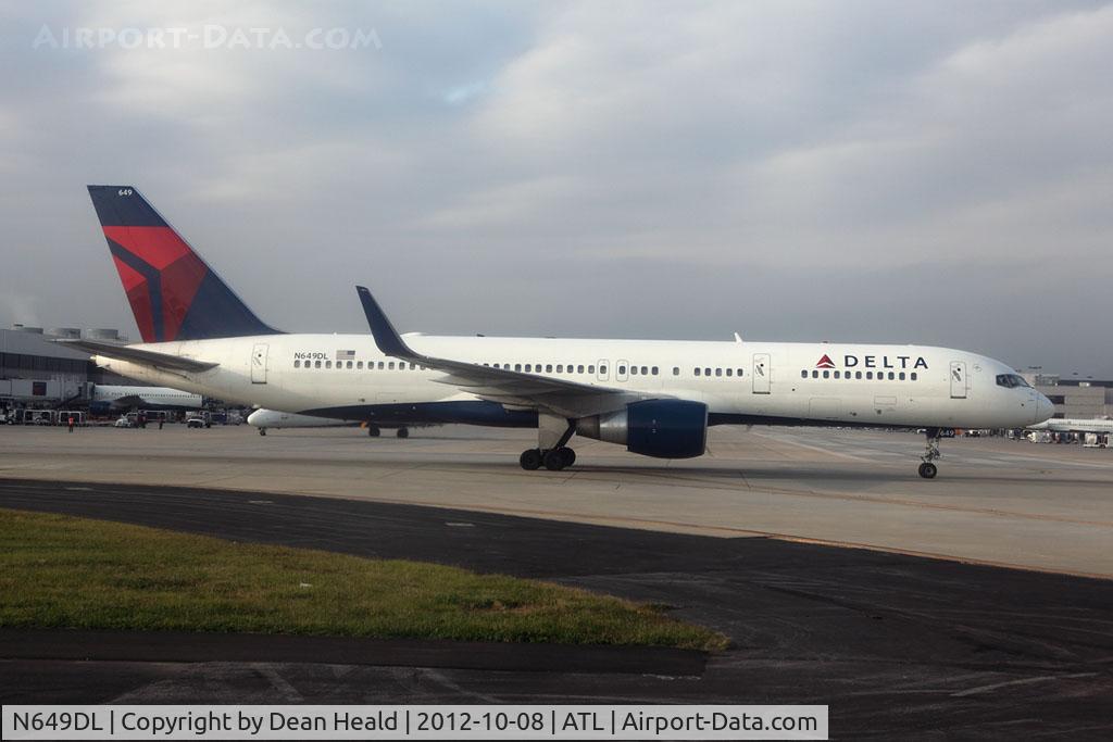 N649DL, 1989 Boeing 757-232 C/N 24389, Delta Air Lines N694DL (FLT DAL2007) taxiing to Gate B27 after arrival from Detroit Metro Wayne County Int'l (KDTW).