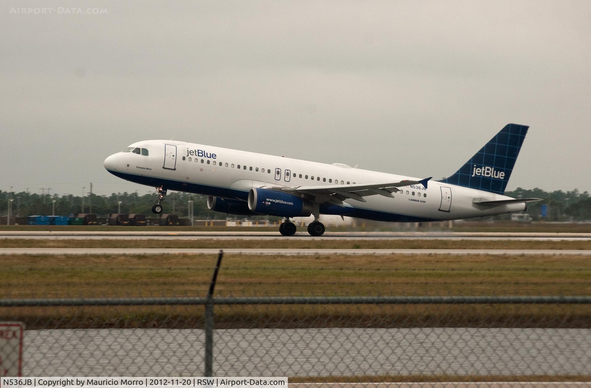N536JB, 2002 Airbus A320-232 C/N 1784, Touching down RWY 6