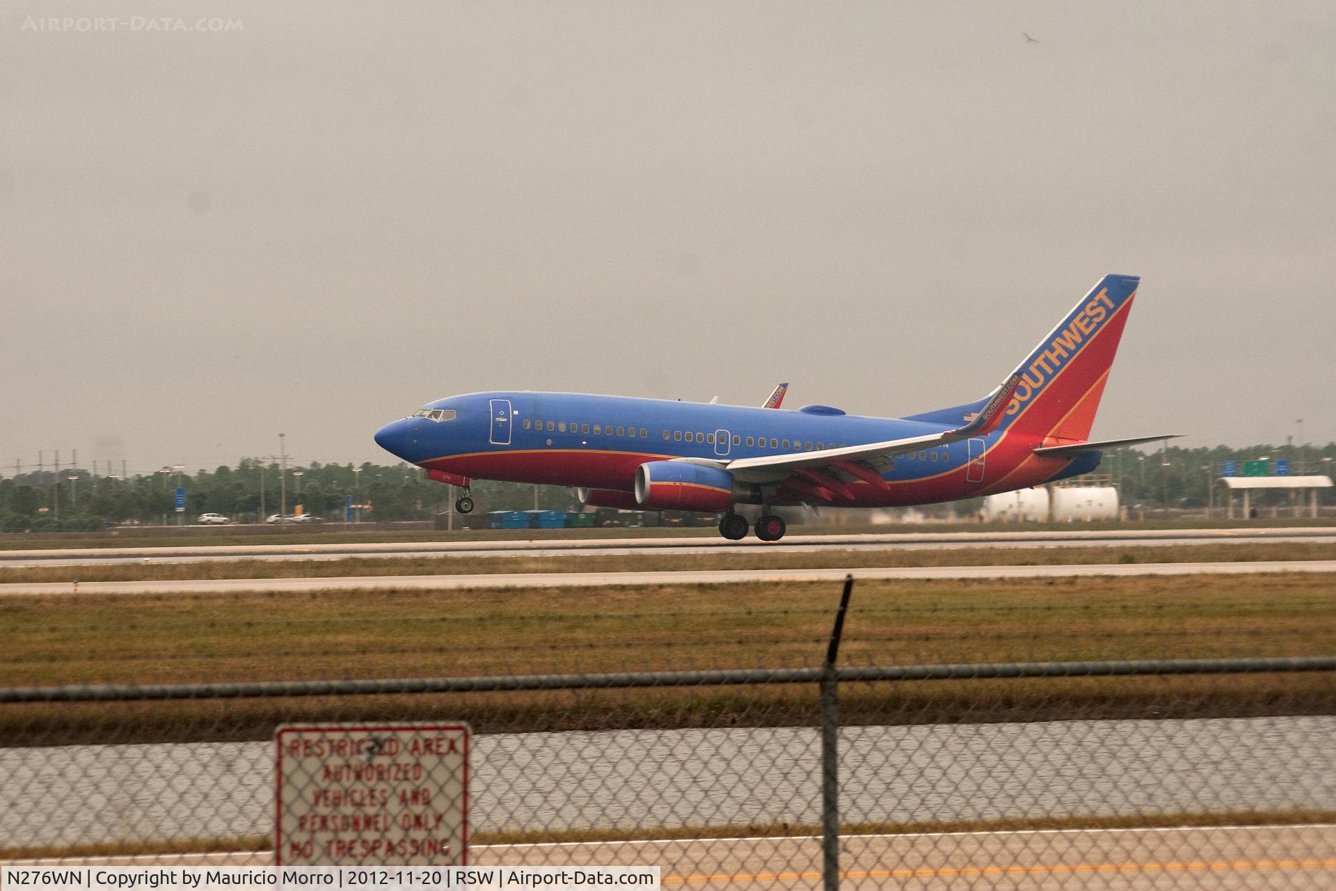 N276WN, 2007 Boeing 737-7H4 C/N 32530, RWY 6 on  a cloudy day