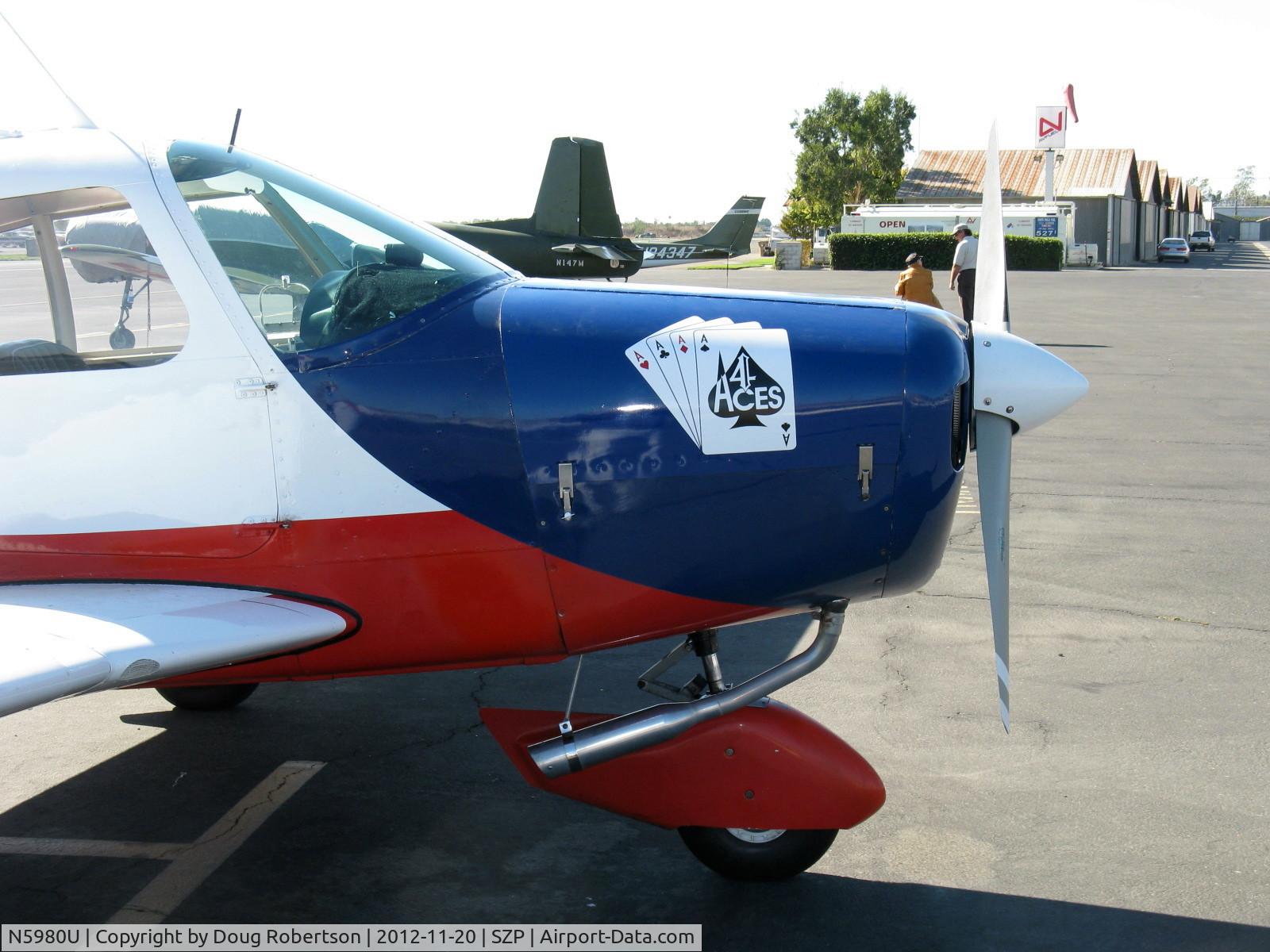 N5980U, 1970 Piper PA-28-140 C/N 28-26870, 1970 Piper PA-28-140 CRUISER, Lycoming O-320-E2A 150 Hp, '4 Aces' cowl logo and Powerflow exhaust mod by STC. Wheel fairings standard this year Cruiser, A sharp-looking Piper!