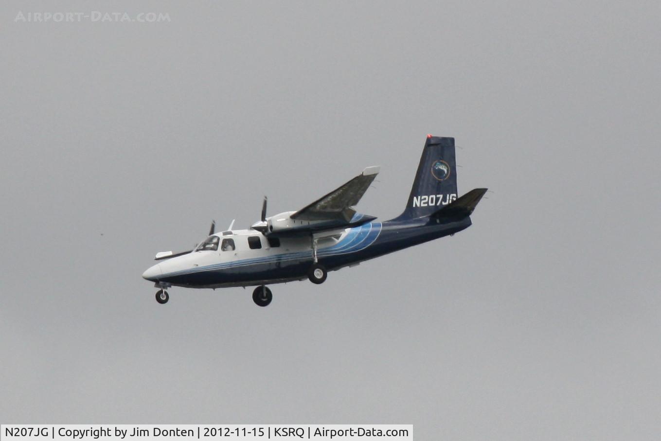 N207JG, 1972 Aero Commander 500 S C/N 3128, Aero Commander 500 (N207JG) on approach to Sarasota-Bradenton International Airport