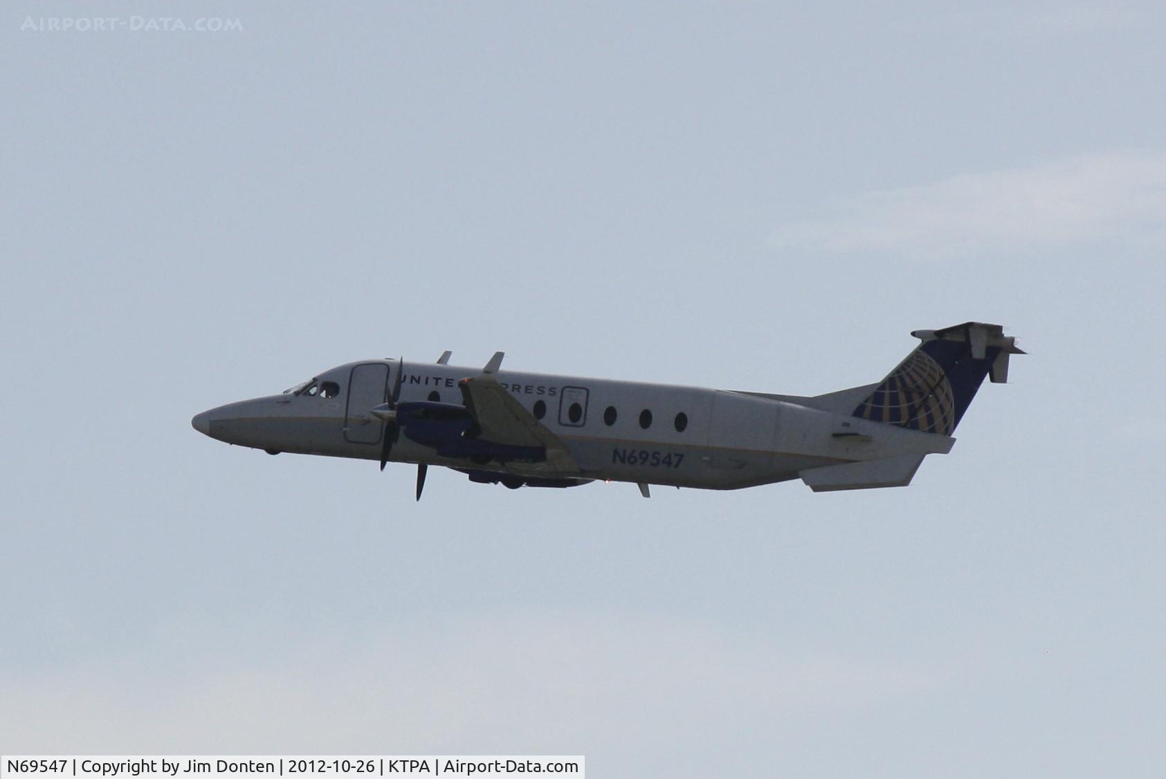 N69547, 1995 Beech 1900D C/N UE-189, United Flight 3994 operated by Silver (N69547) departs Tampa International Airport enroute to Tallahassee Regional Airport