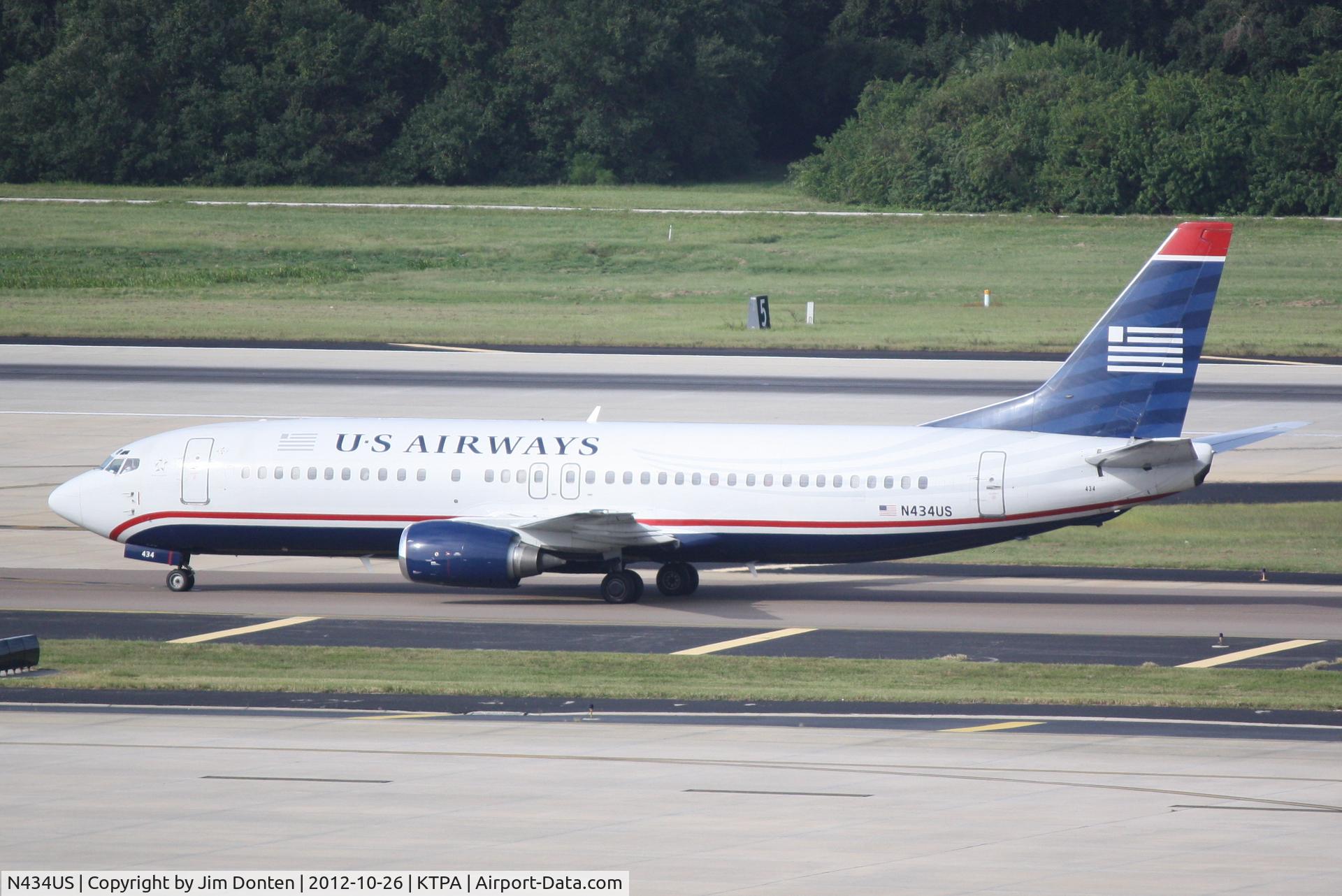 N434US, 1990 Boeing 737-4B7 C/N 24556, US Air Flight 1881 (N434US) arrives at Tampa International Airport following a flight from Philadelphia International Airport