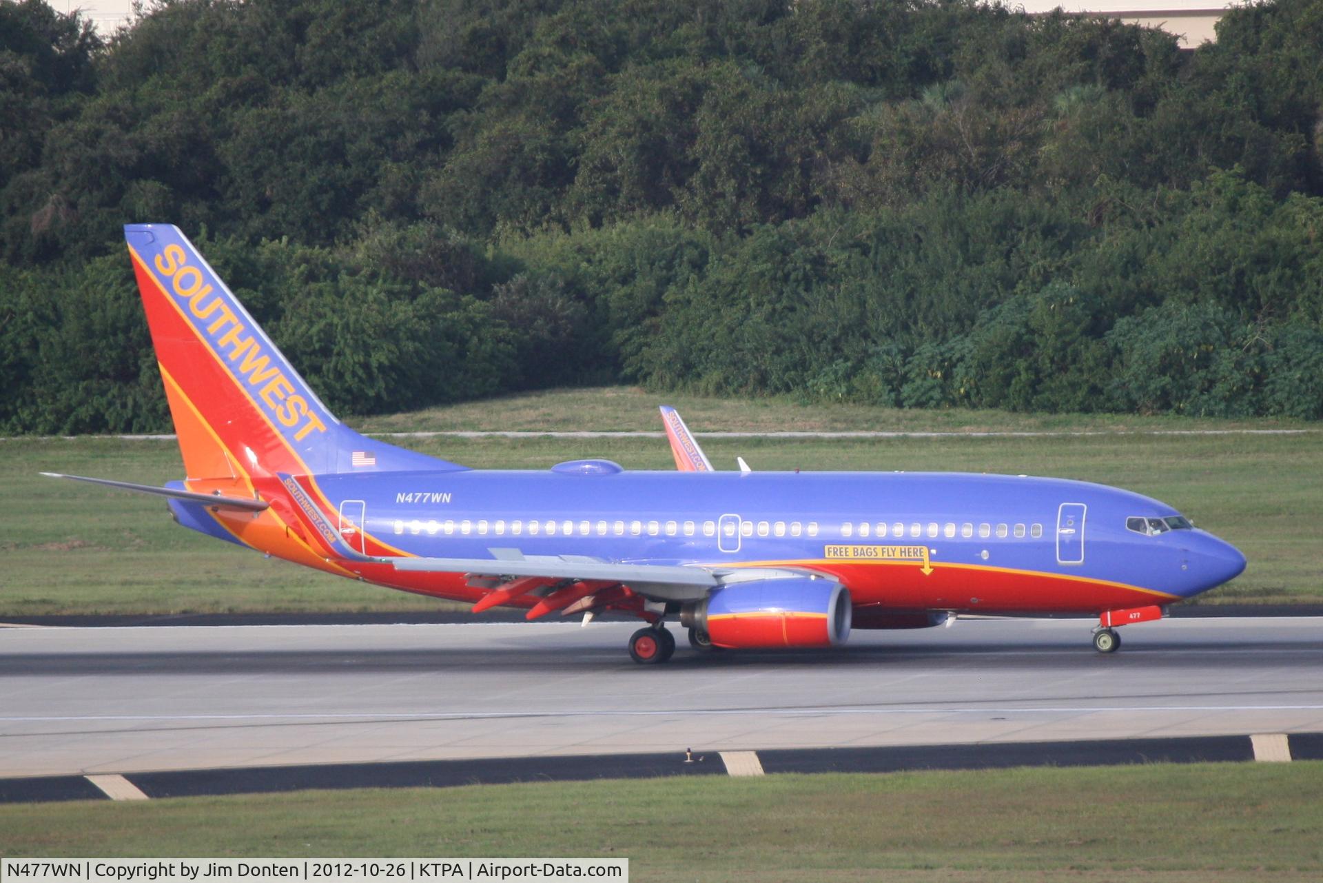 N477WN, 2004 Boeing 737-7H4 C/N 33988, Southwest Flight 2003 (N477WN) arrives at Tampa International Airport following a flight from Raliegh-Durham International Airport