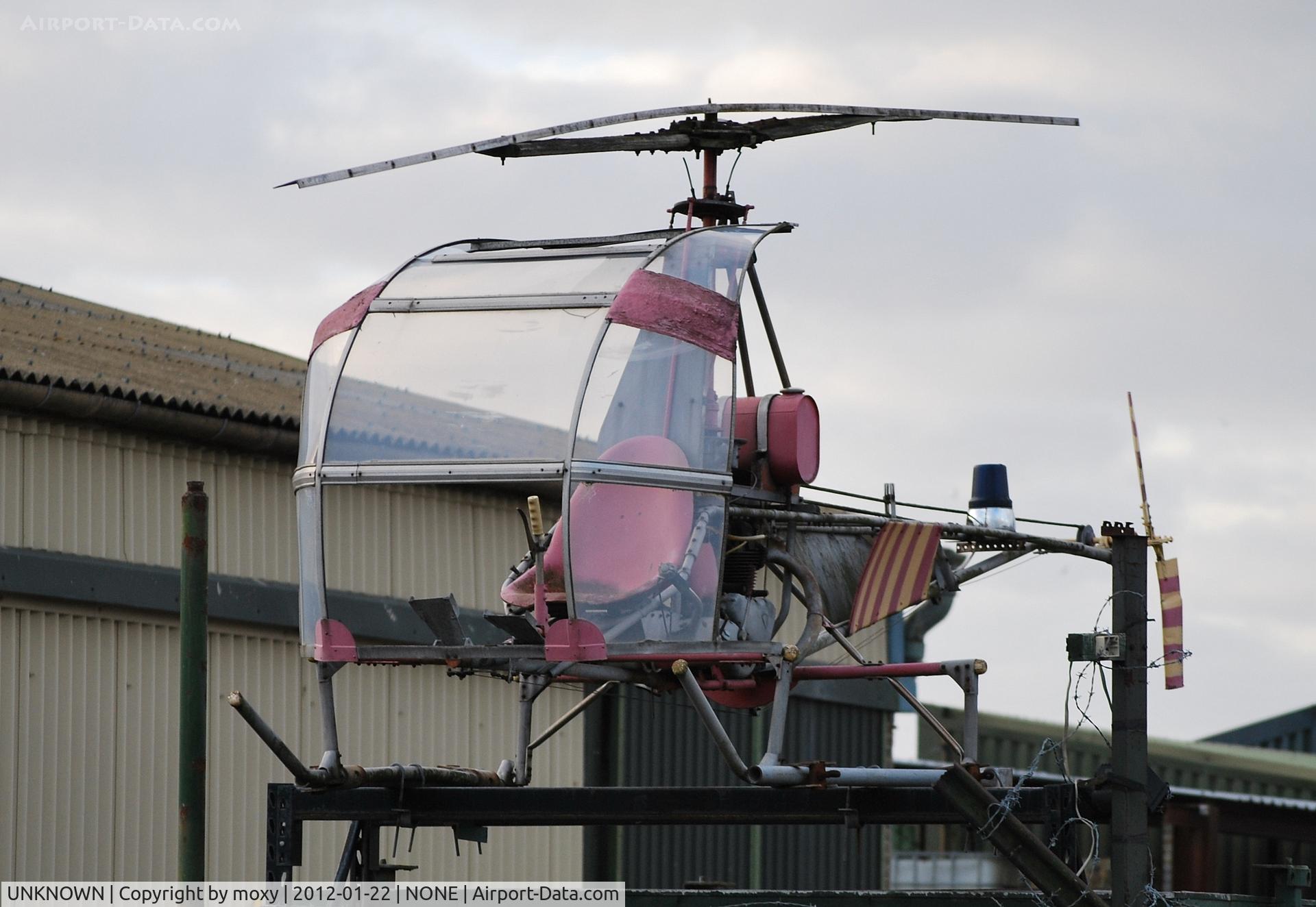 UNKNOWN, Helicopters Various C/N unknown, Unregistered Adams-Wilson XH-1 Hobbycopter (Choppy) in a yard in Sunbury-on-Thames. It's been there or thereabouts over 40 years. Powered by a 50 hp Triumph motorcycle engine.