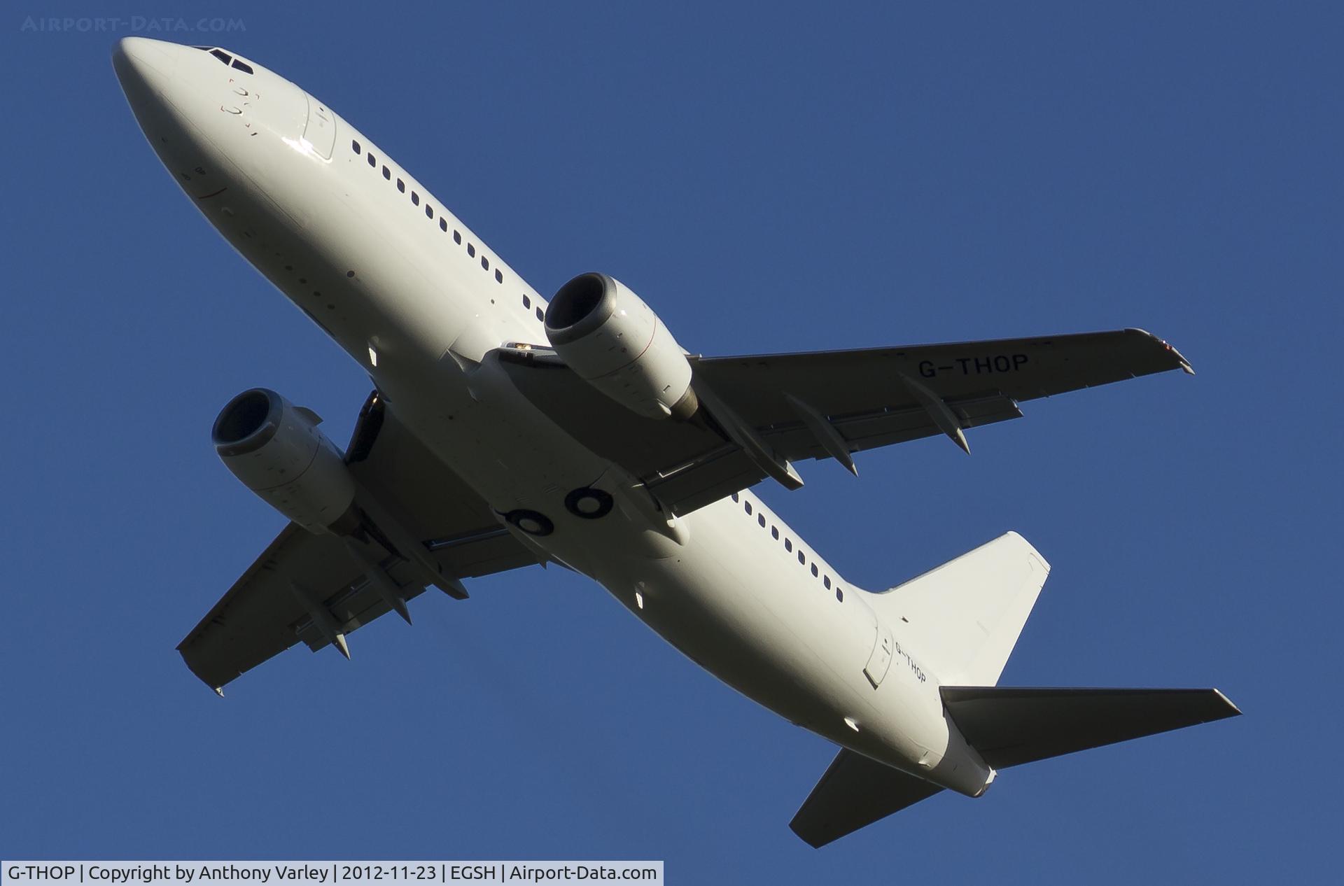 G-THOP, 1998 Boeing 737-3U3 C/N 28740, Departing after spray.