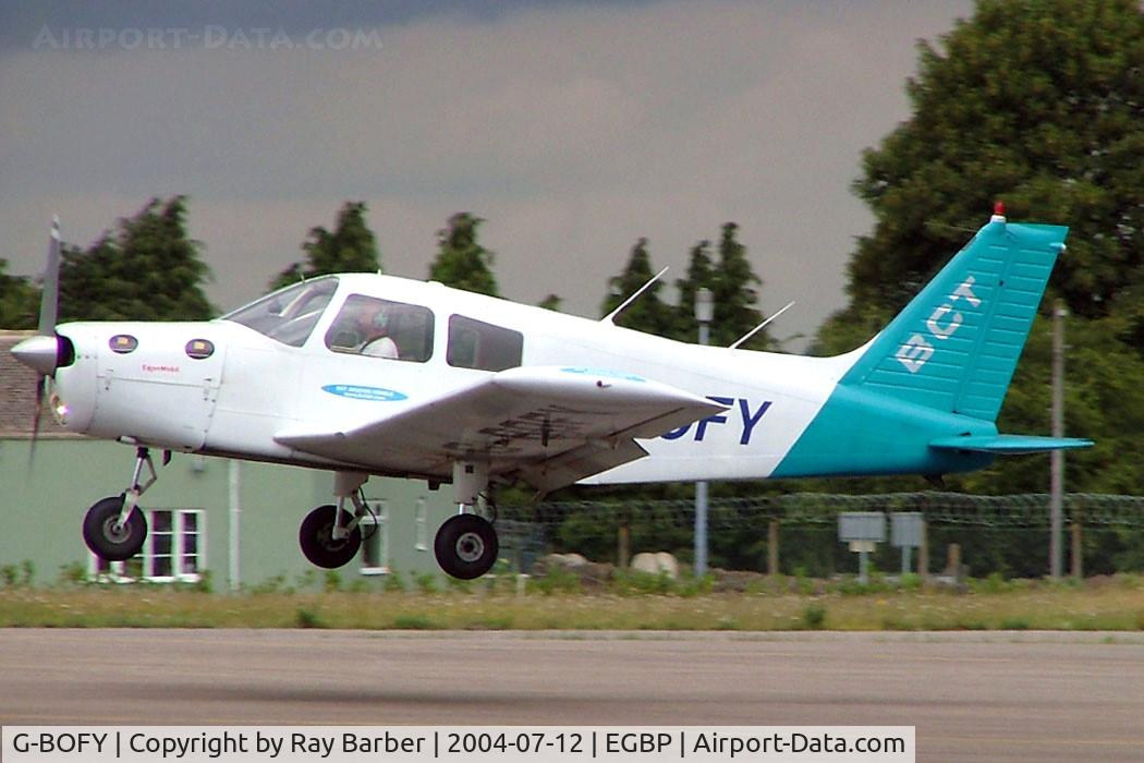 G-BOFY, 1974 Piper PA-28-140 Cherokee Cruiser C/N 28-7425374, Piper PA-28-140 Cherokee Cruiser [28-7425374] Kemble~G 12/07/2004. About to land.