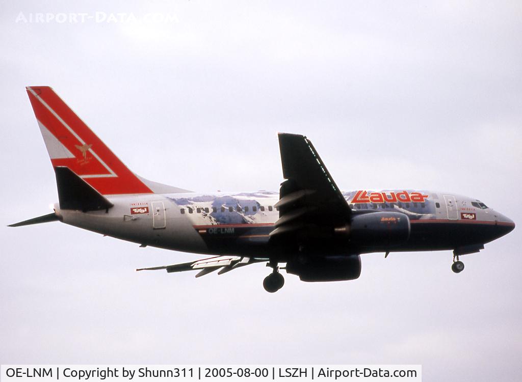OE-LNM, 2000 Boeing 737-6Z9 C/N 30138, Landing rwy 32 in Tyrol-Innsbruck liverypromoting the Austrian Alps