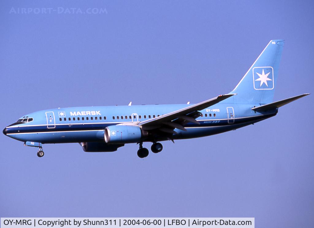 OY-MRG, 1999 Boeing 737-7L9 C/N 28010, Landing rwy 32R in first c/s