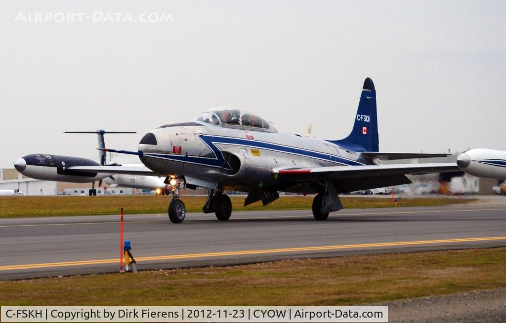 C-FSKH, 1957 Canadair T-33AN Silver Star 3 C/N T33-590, This classic T-bird is taxing towards rwy 25, for takeoff.